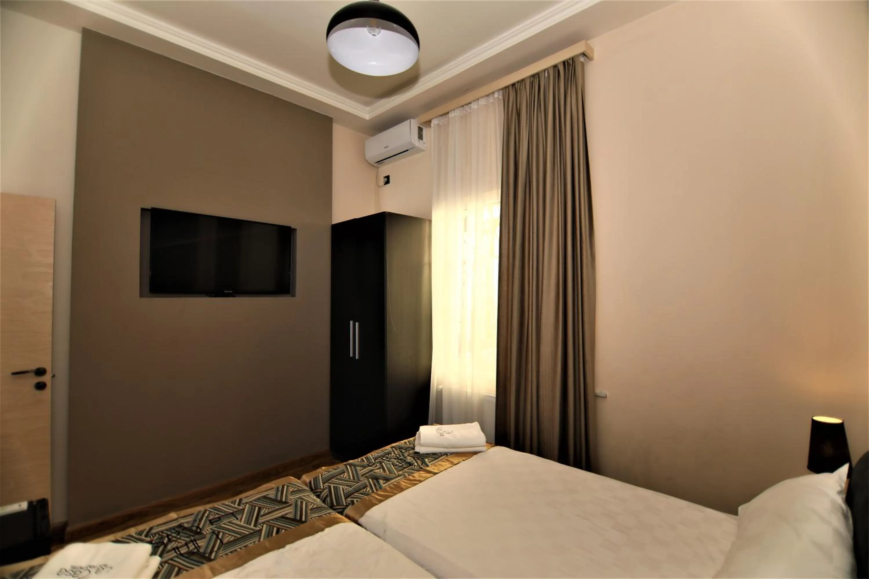 Bed in La Casa Hotel Yerevan