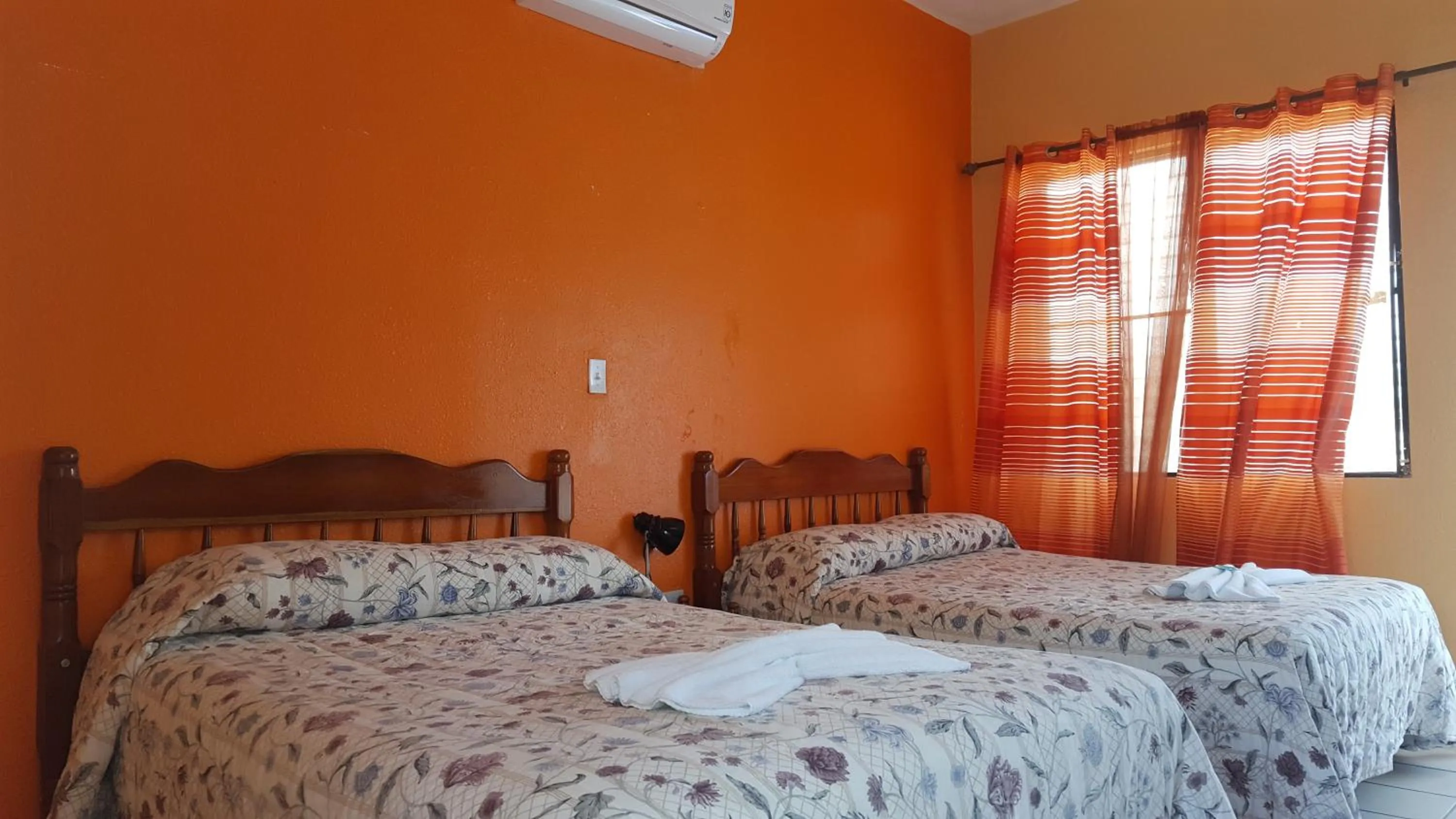 Bedroom, Bed in Anchorage Beach Resort Caye Caulker