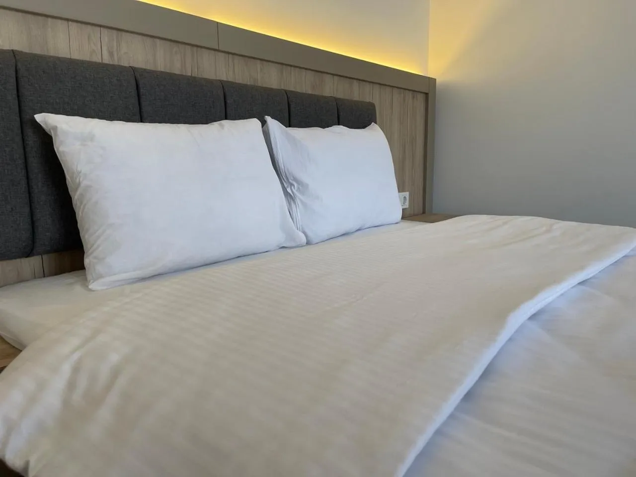 Bed in Weseler Wirtshaus Appartements