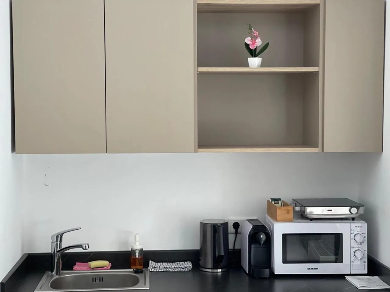 Kitchen or kitchenette in Weseler Wirtshaus Appartements