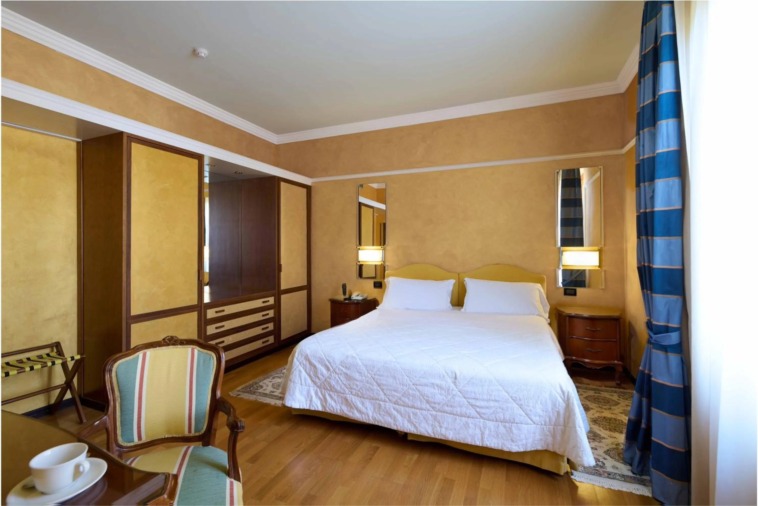 Bedroom, Bed in Grand Hotel Bellavista Palace & Golf