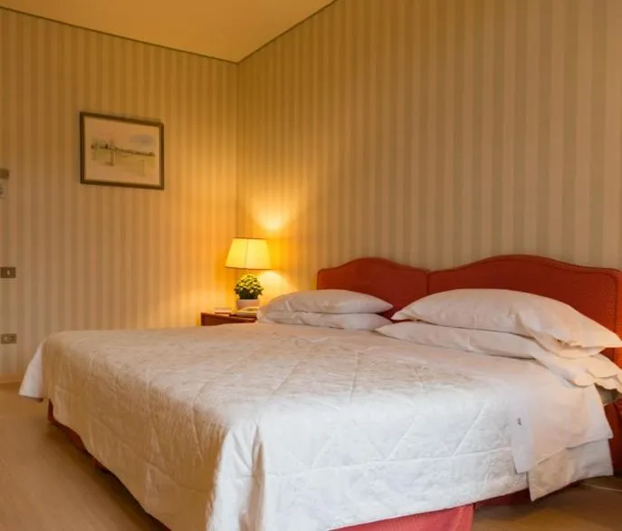 Bedroom, Bed in Grand Hotel Bellavista Palace & Golf