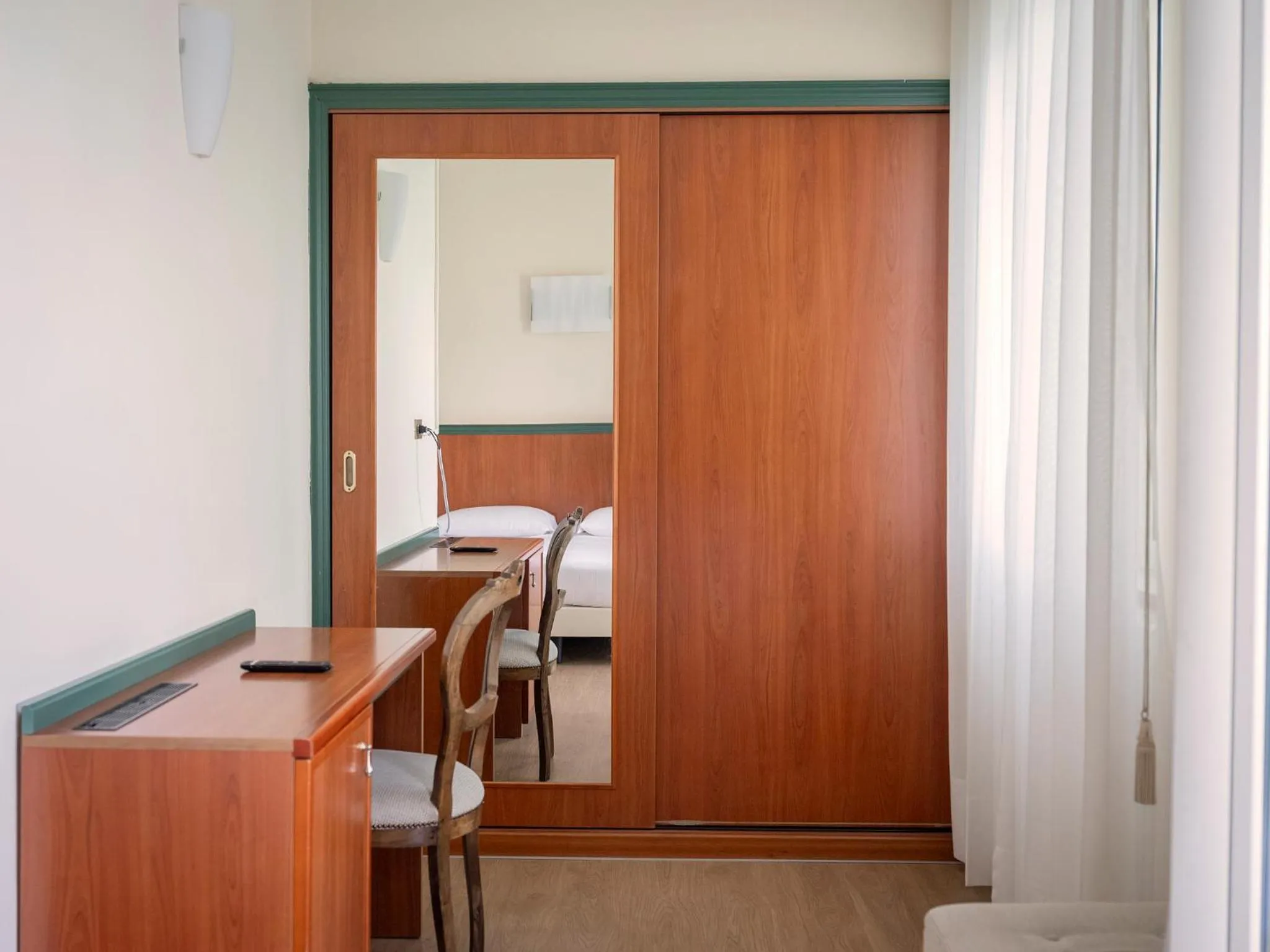 Bedroom in Hotel Carillon