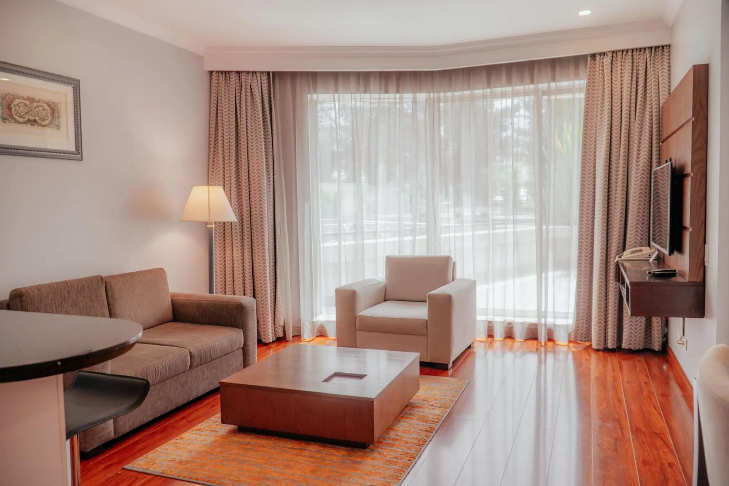 Communal lounge/ TV room in Aparta Hotel Torres de Suites