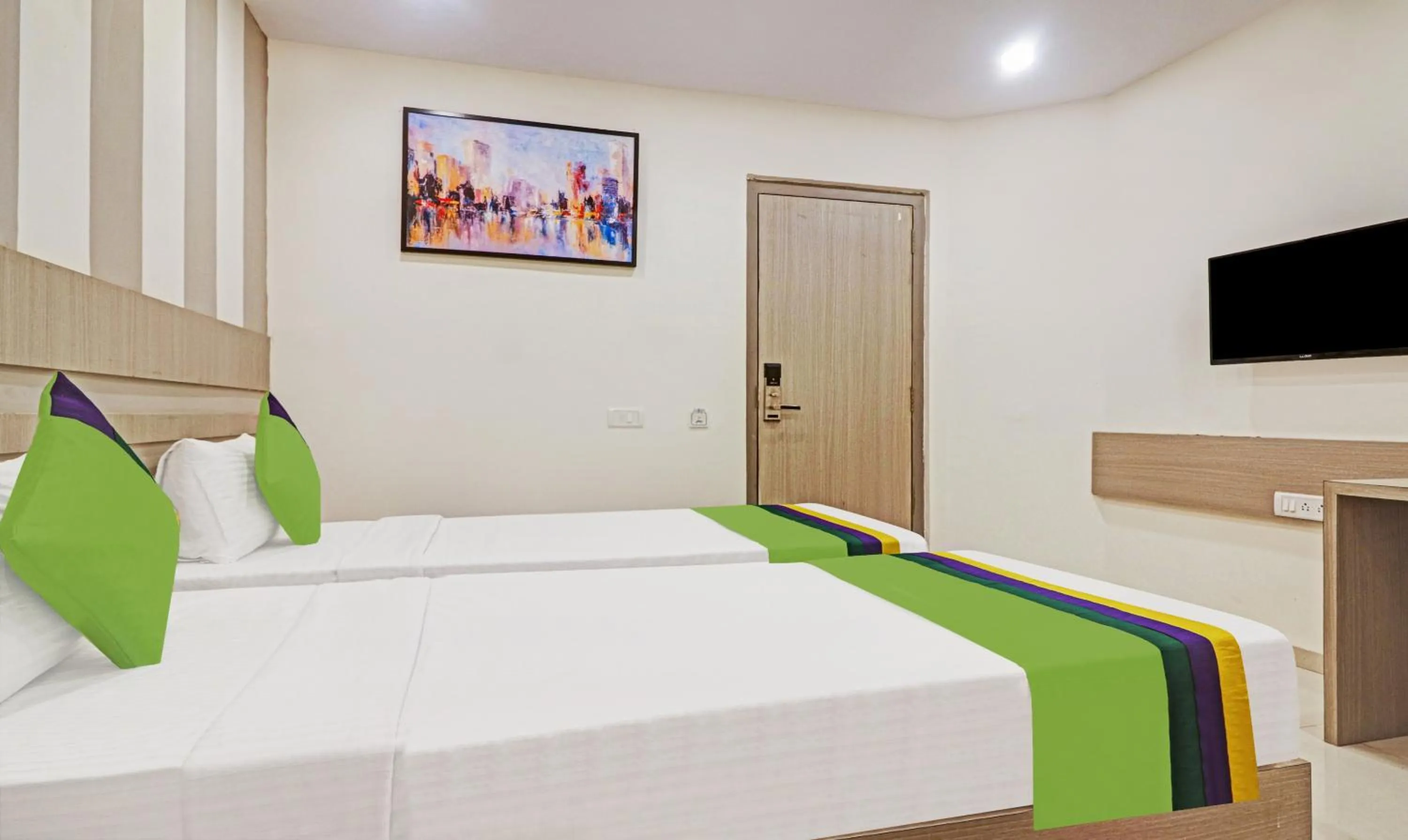 Bedroom, Bed in Treebo Arastu Grand