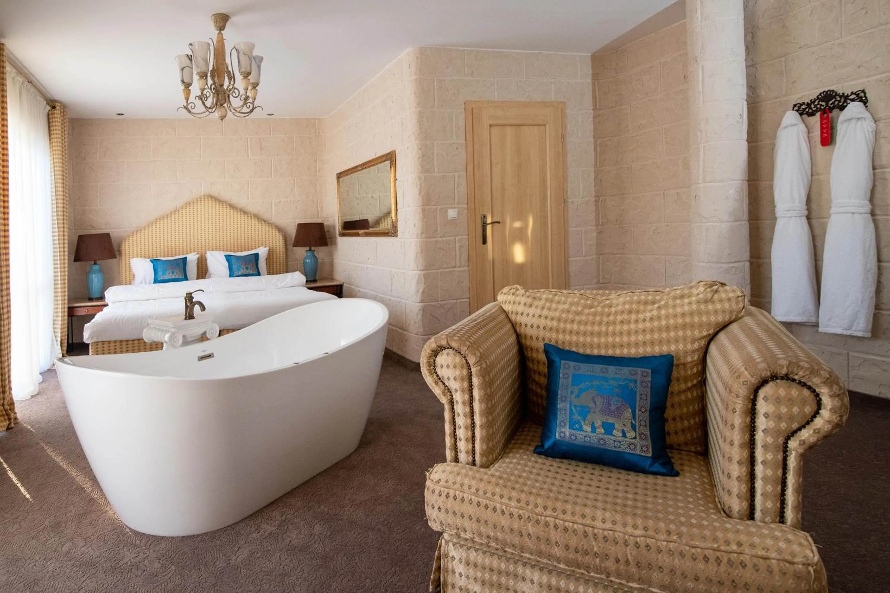 Seating area, Bed in Hotel Azzun Orient SPA&Wellness