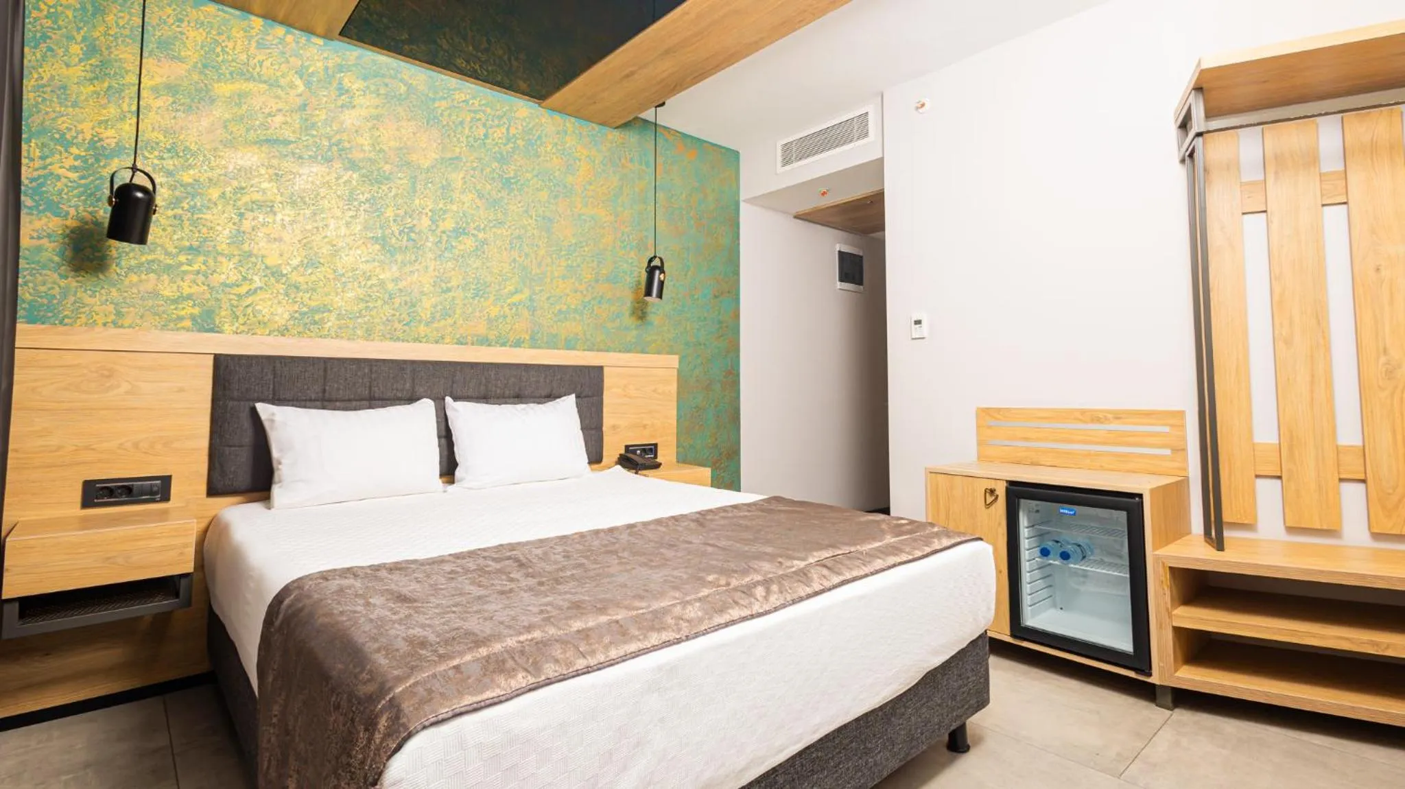 Bed in Peramis Hotel & Spa