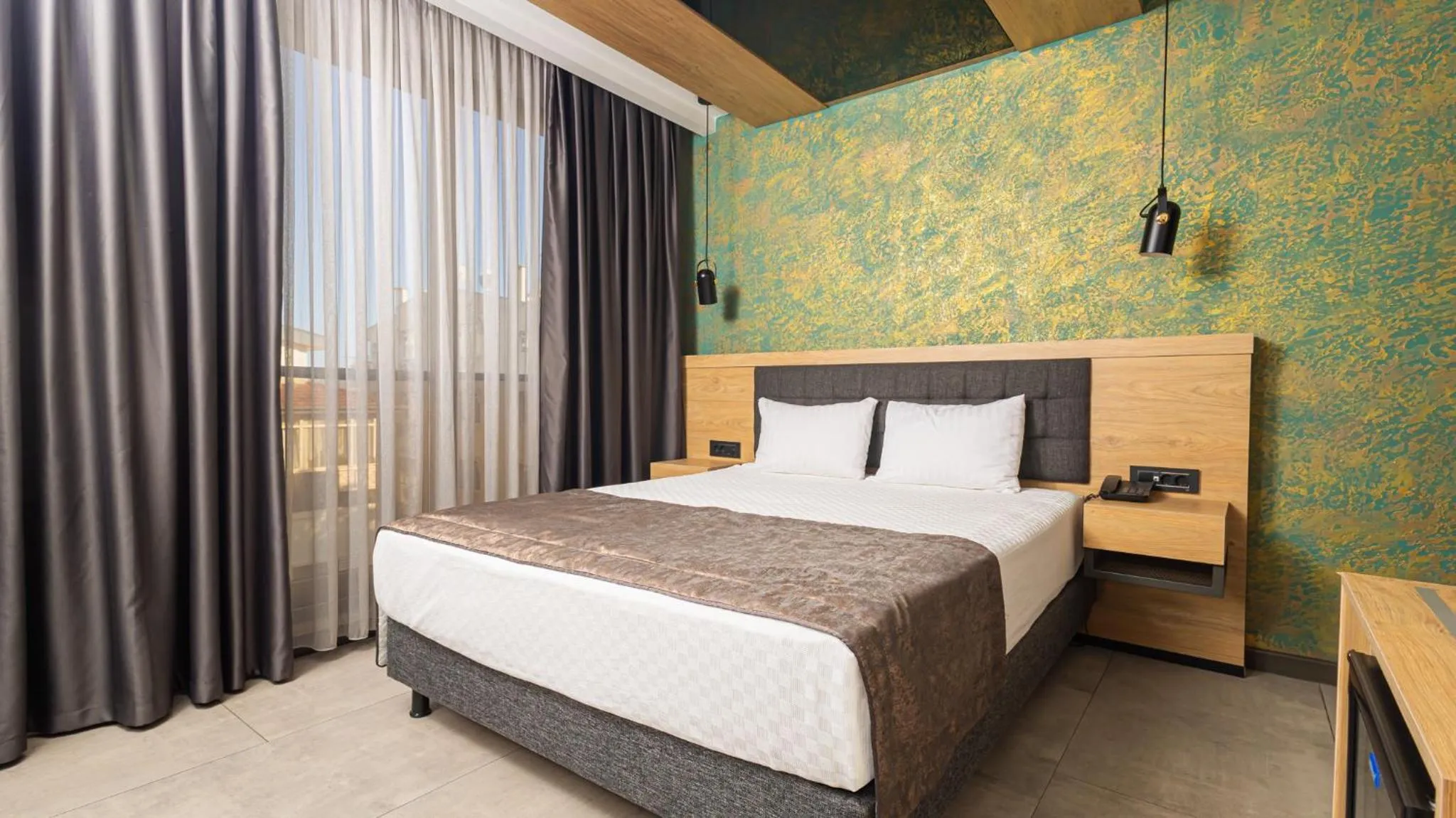 Bed in Peramis Hotel & Spa