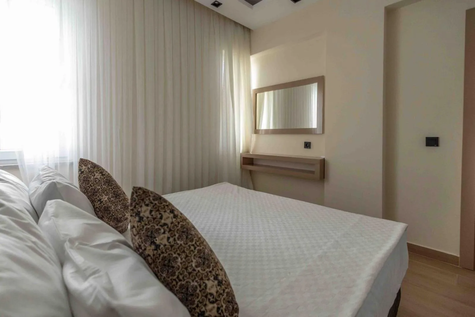 Bed in Peramis Hotel & Spa