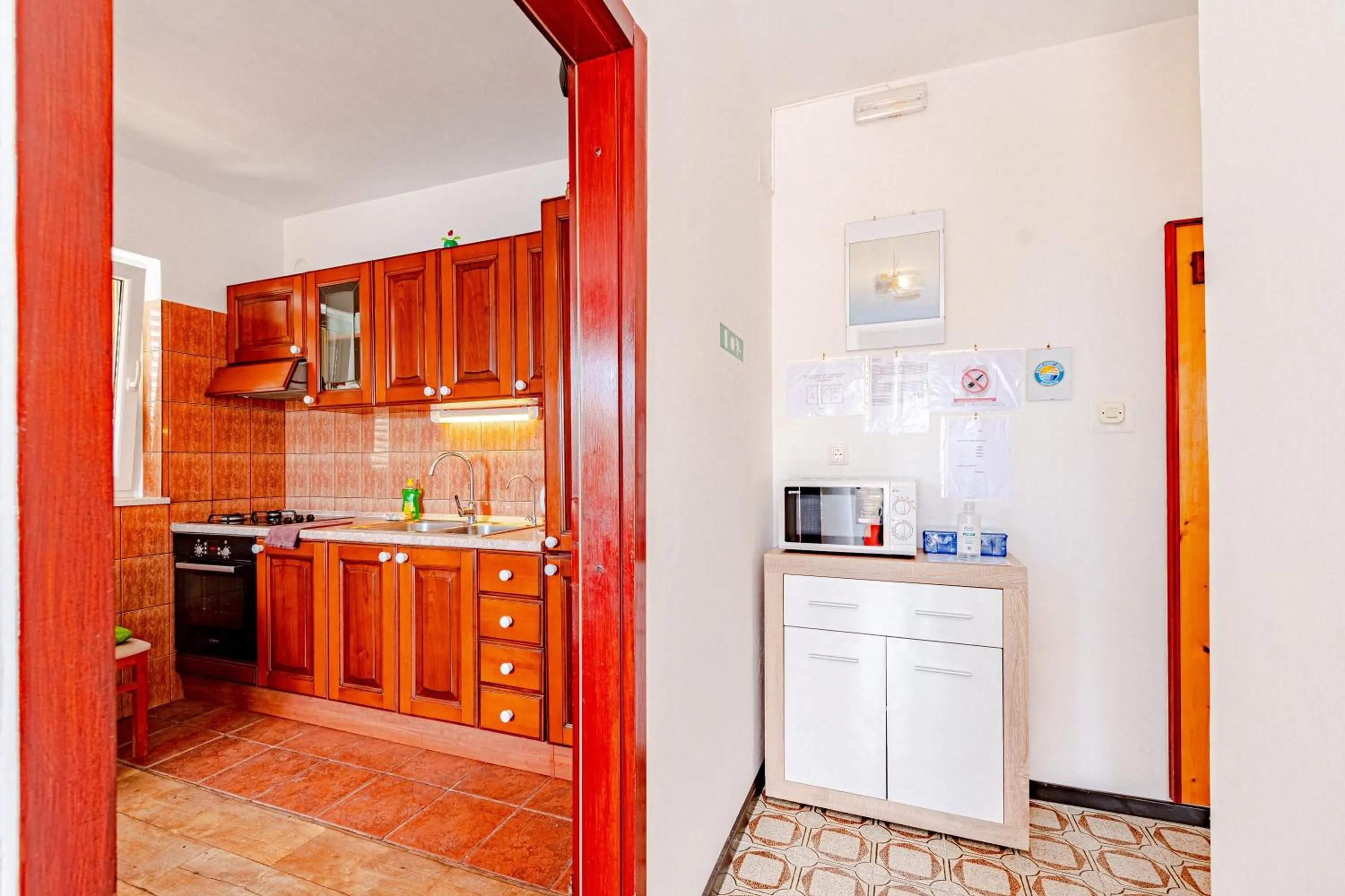 Kitchen or kitchenette in Apartments Siri, 1 min walk to the beach