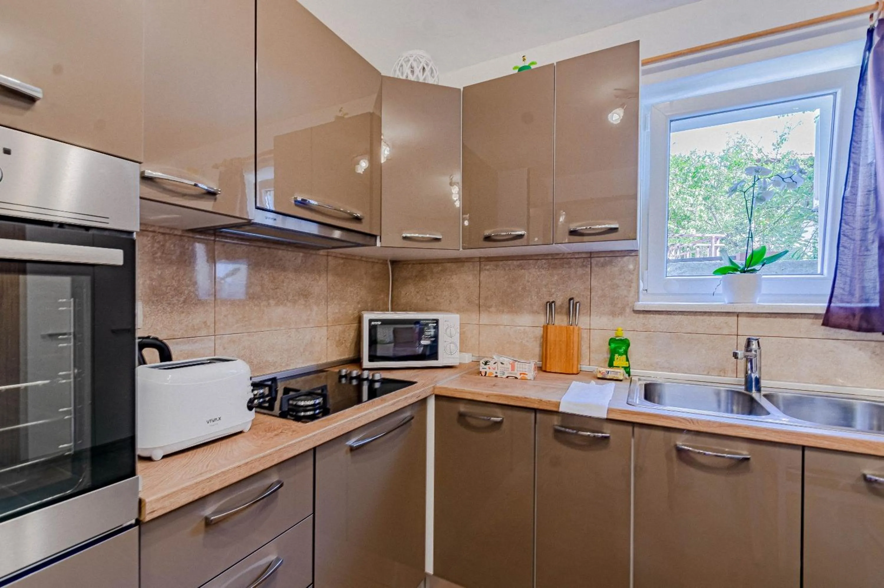 Kitchen or kitchenette in Apartments Siri, 1 min walk to the beach
