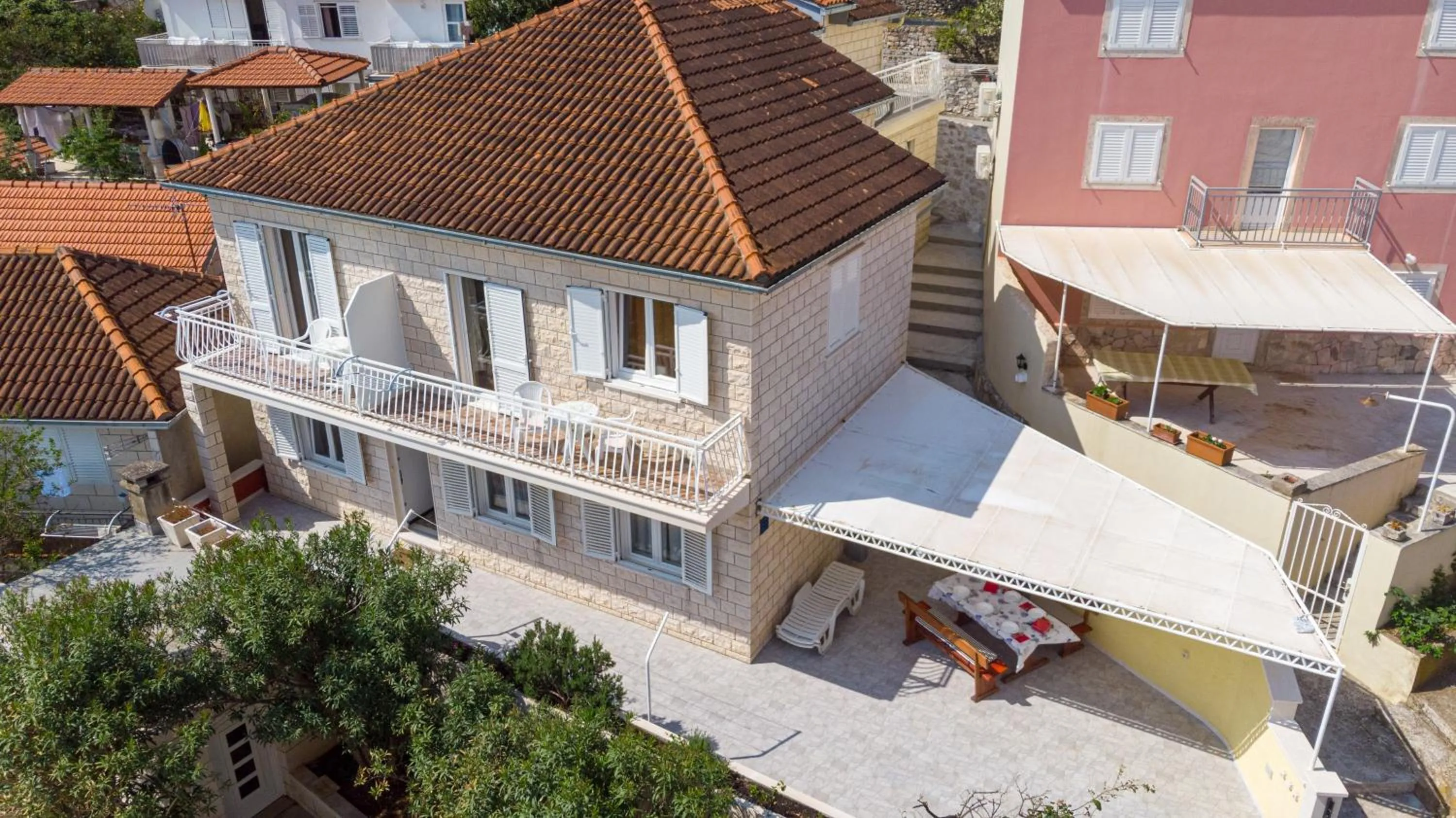 Property building in Apartments Siri, 1 min walk to the beach