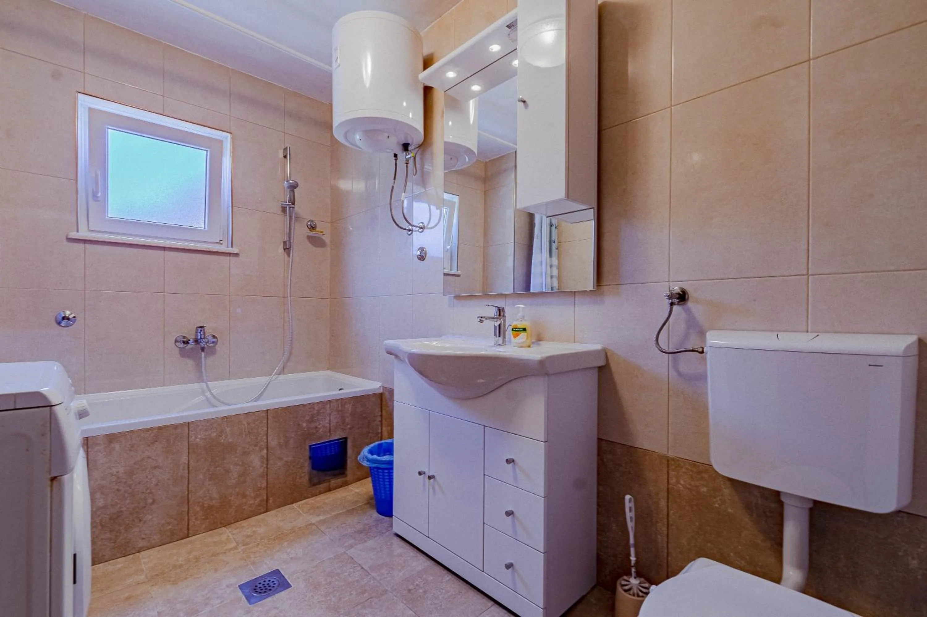 Bathroom in Apartments Siri, 1 min walk to the beach