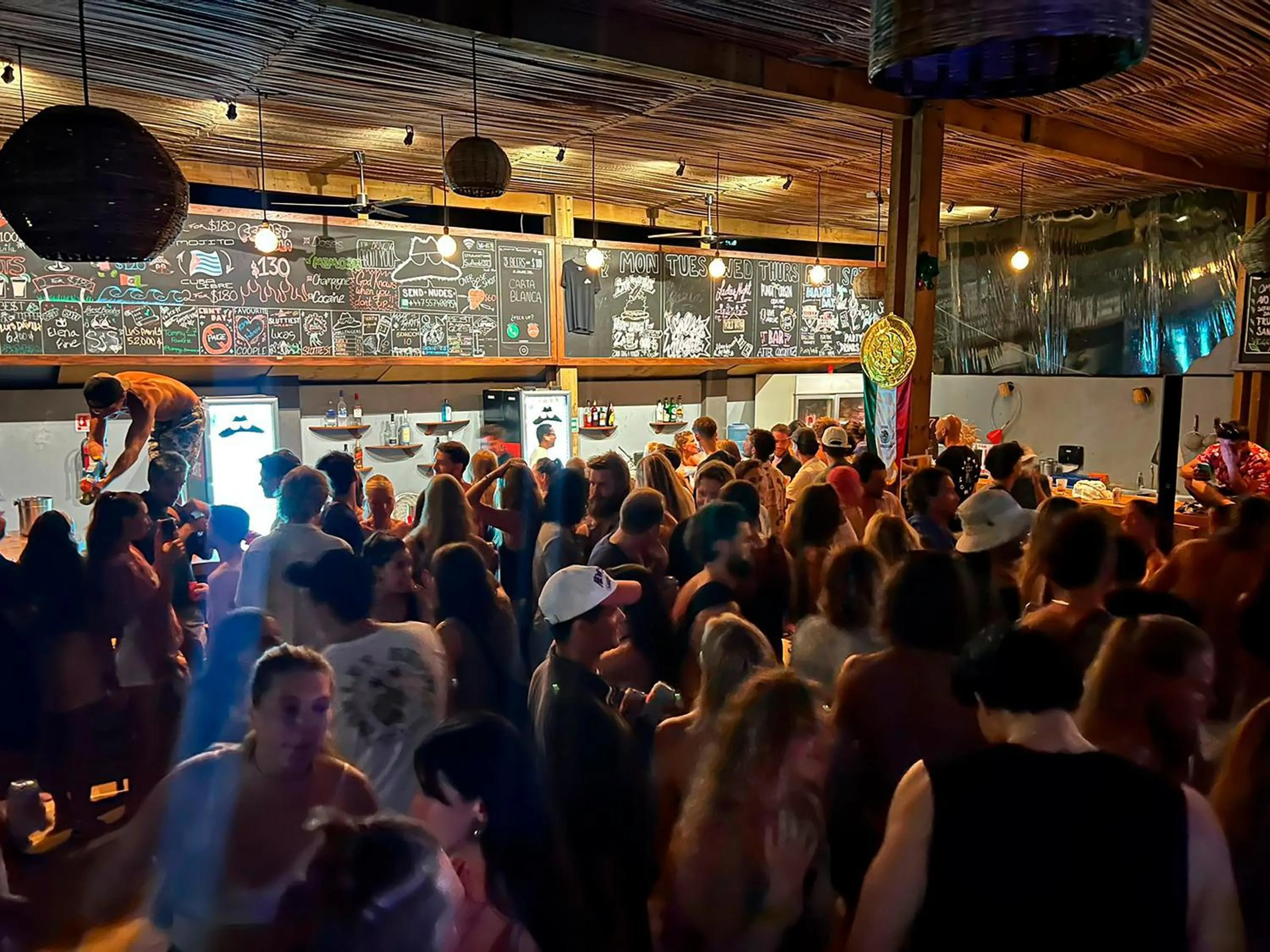 People in Straw Hat Surf Hostel & Bar