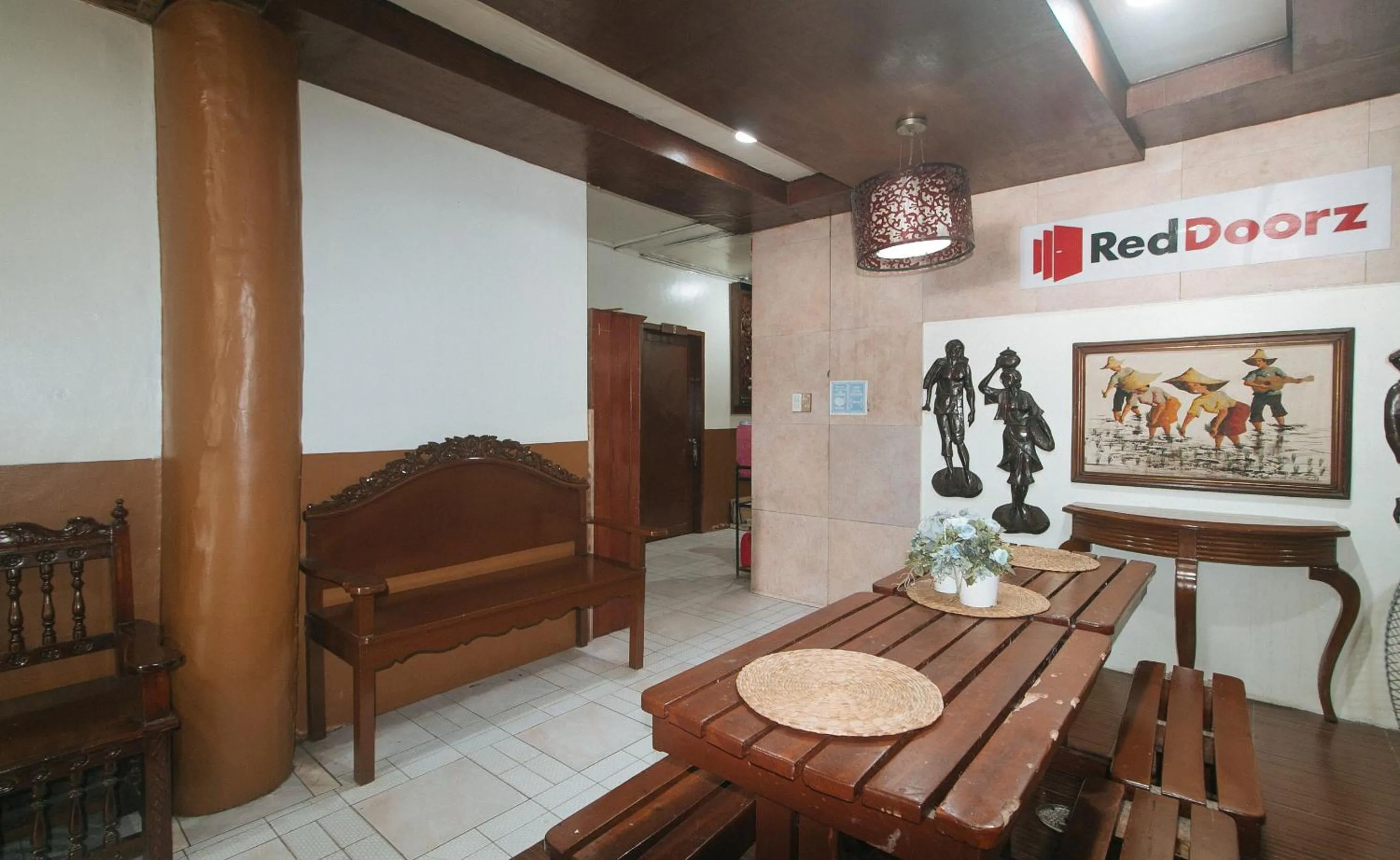 Seating area in RedDoorz @ Plaza La Paz Iloilo City