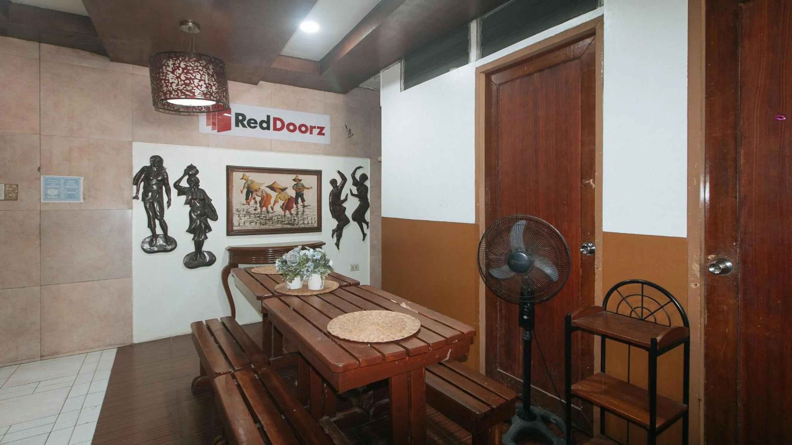 Seating area in RedDoorz @ Plaza La Paz Iloilo City