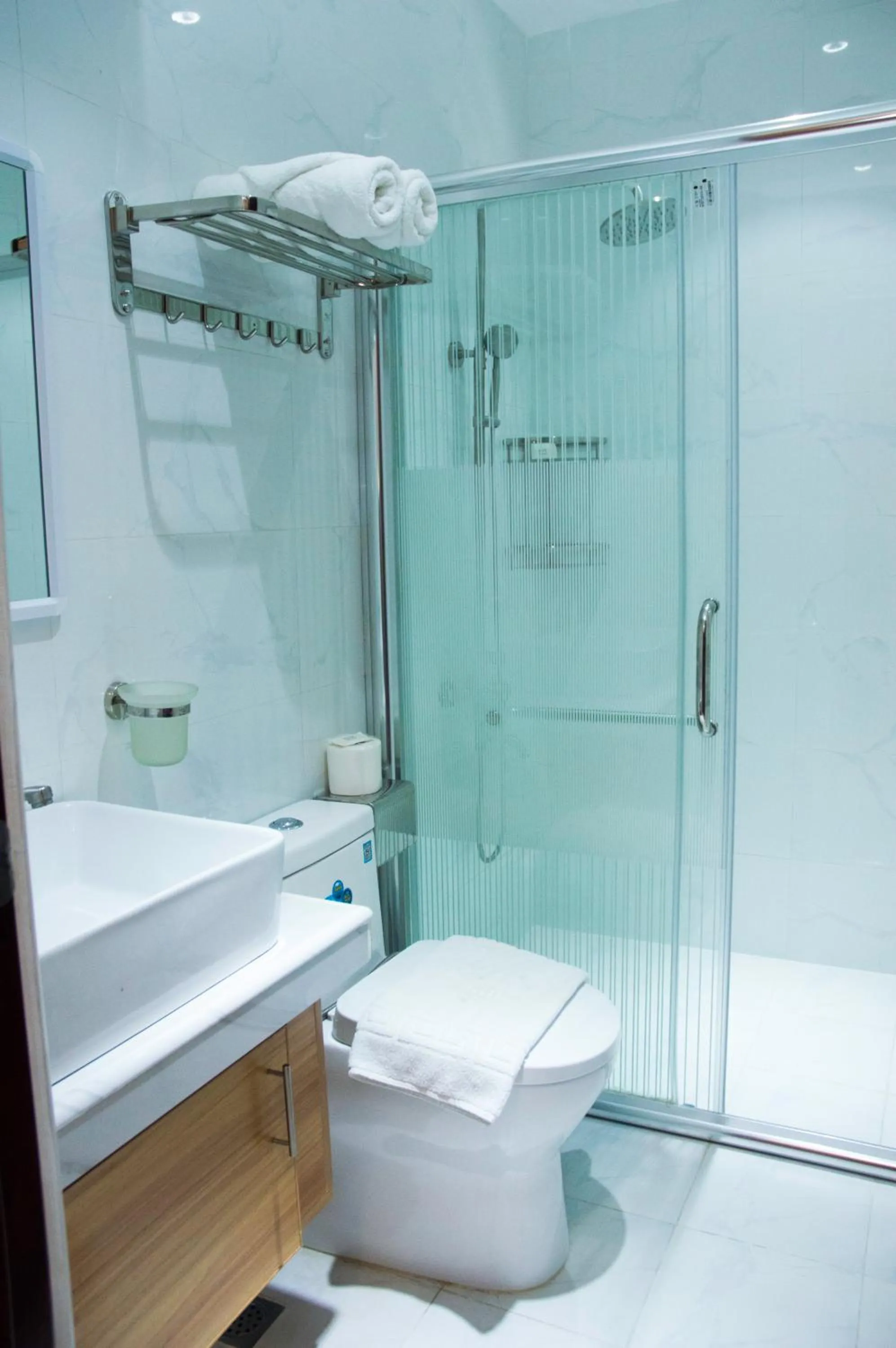 Toilet in ELTI SUITES By Bluebookers