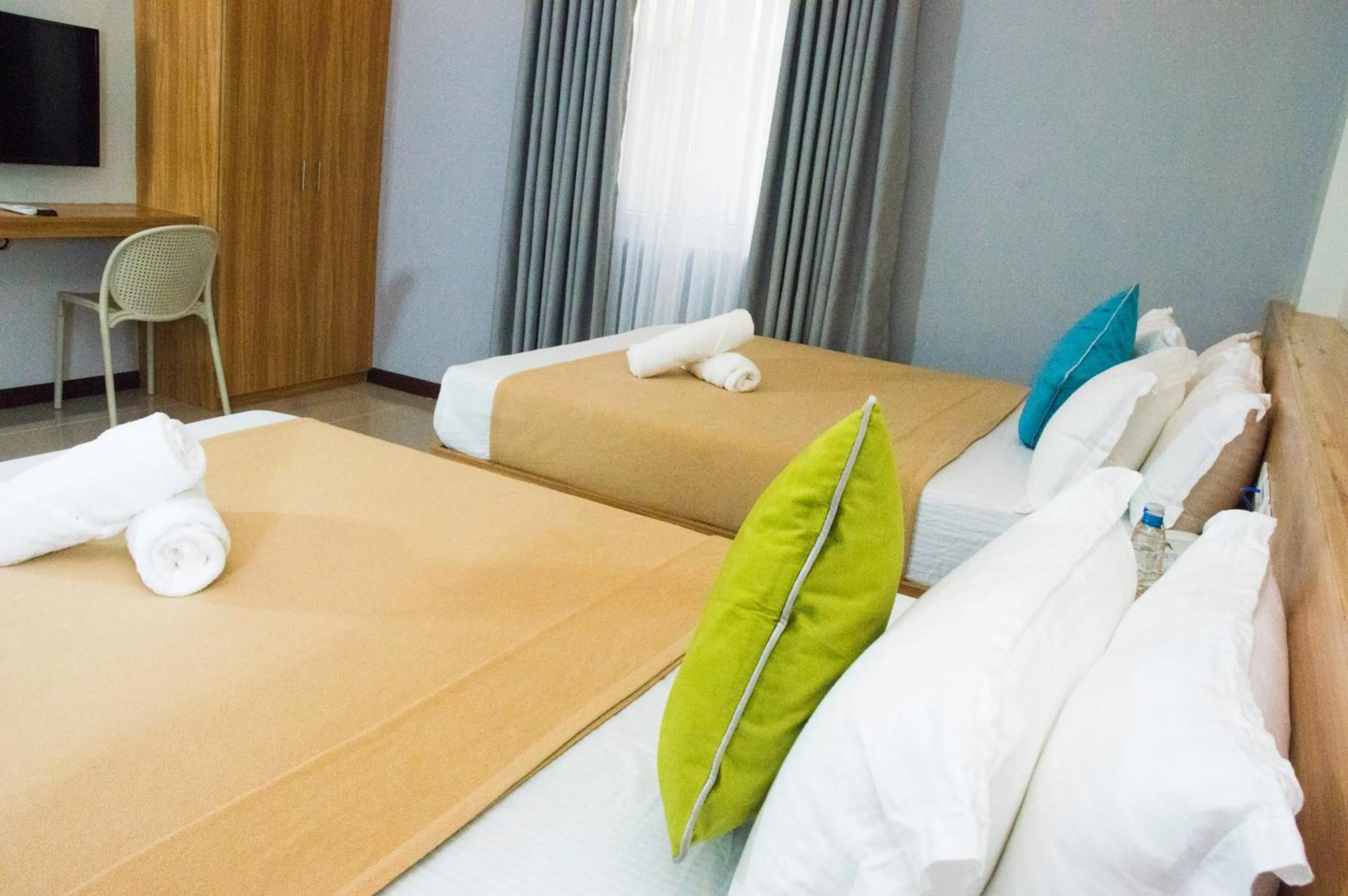 Bed in ELTI SUITES By Bluebookers