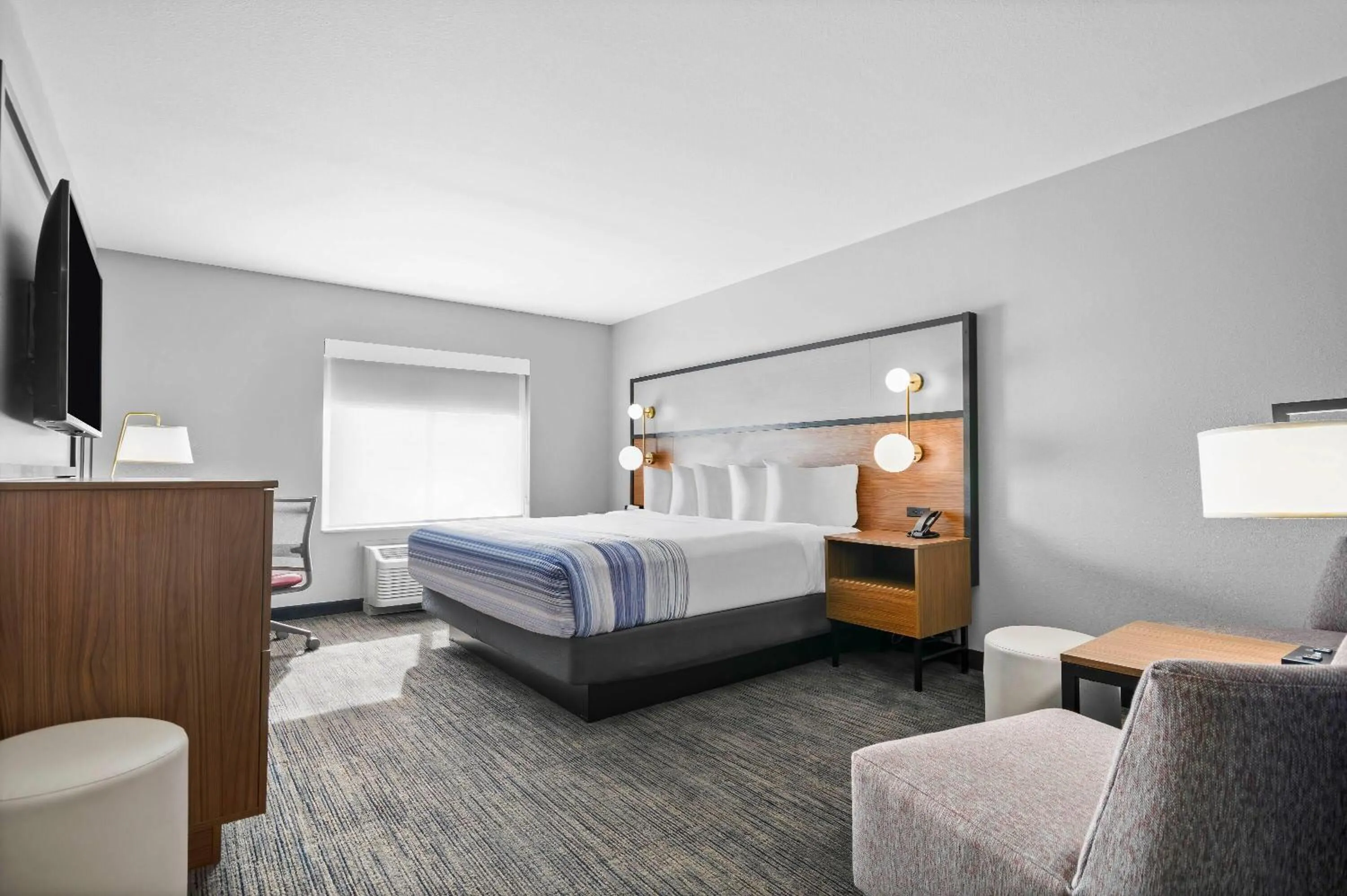 Bed in AmericInn by Wyndham International Falls