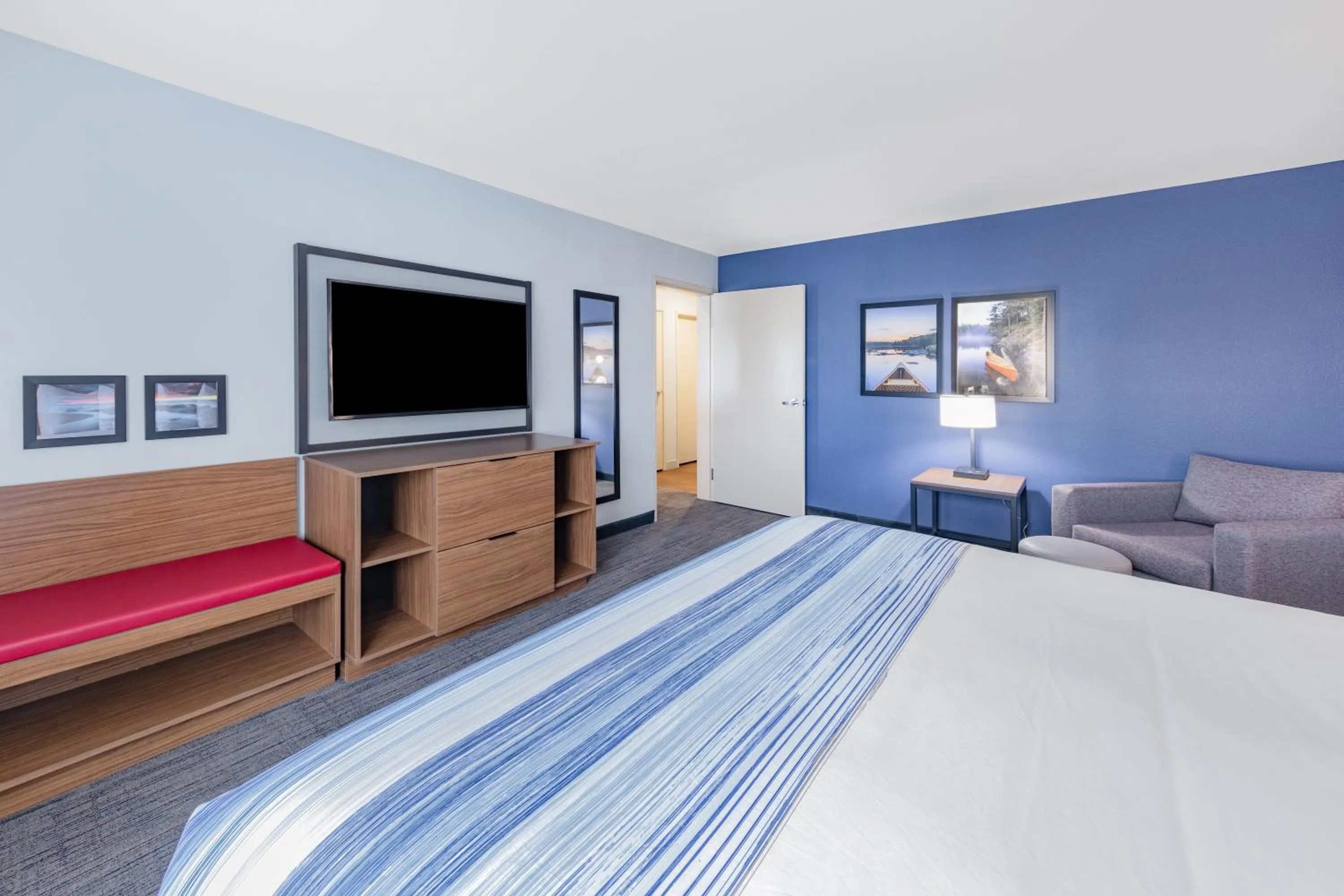 Bedroom, Bed in AmericInn by Wyndham International Falls