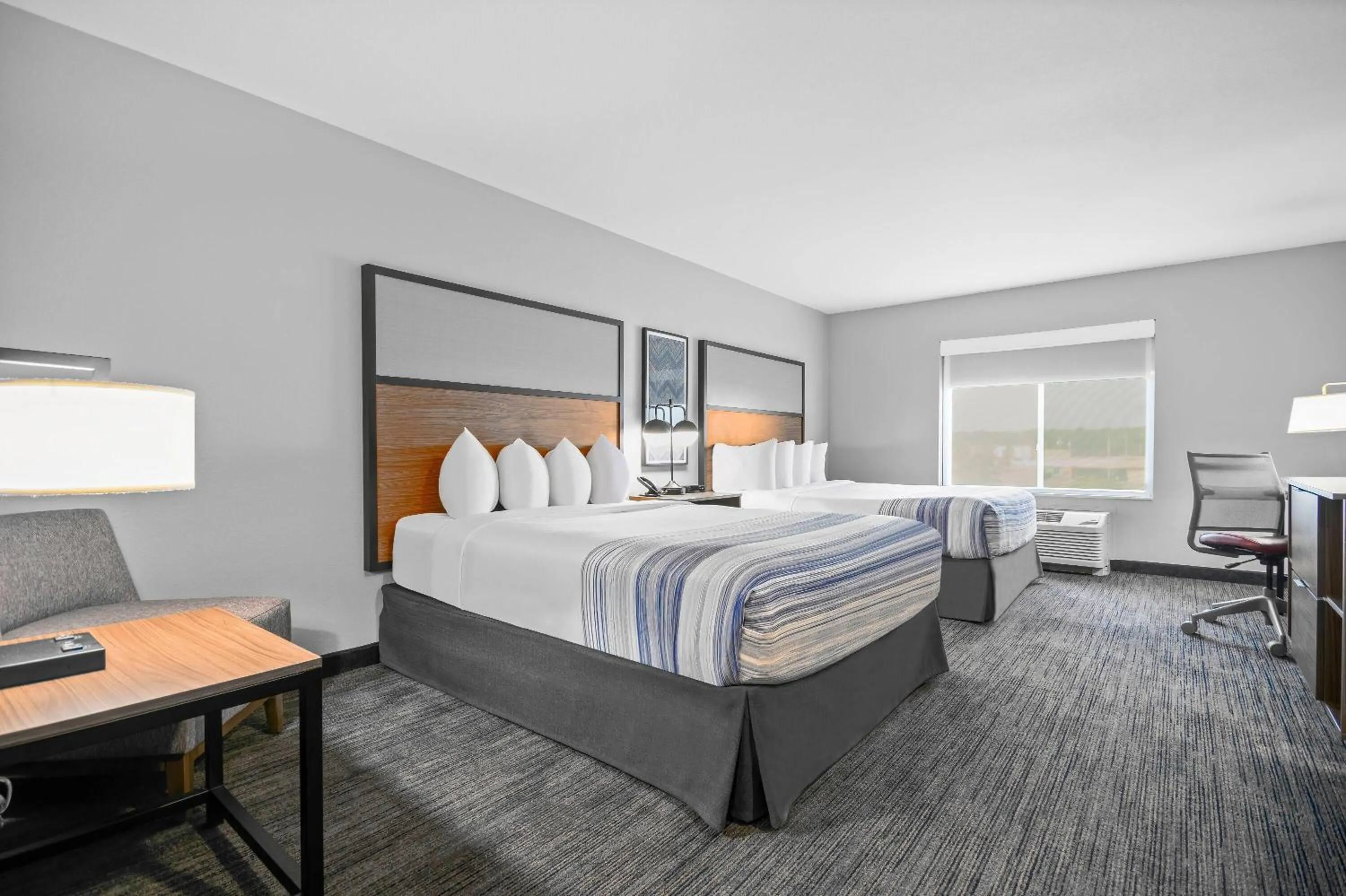 Photo of the whole room, Bed in AmericInn by Wyndham International Falls