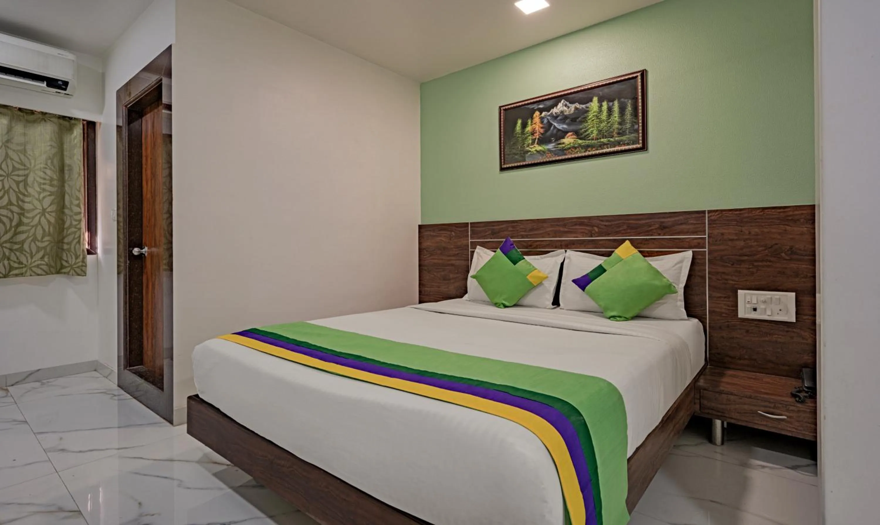 Bedroom, Bed in Treebo Atithi Inn Malad