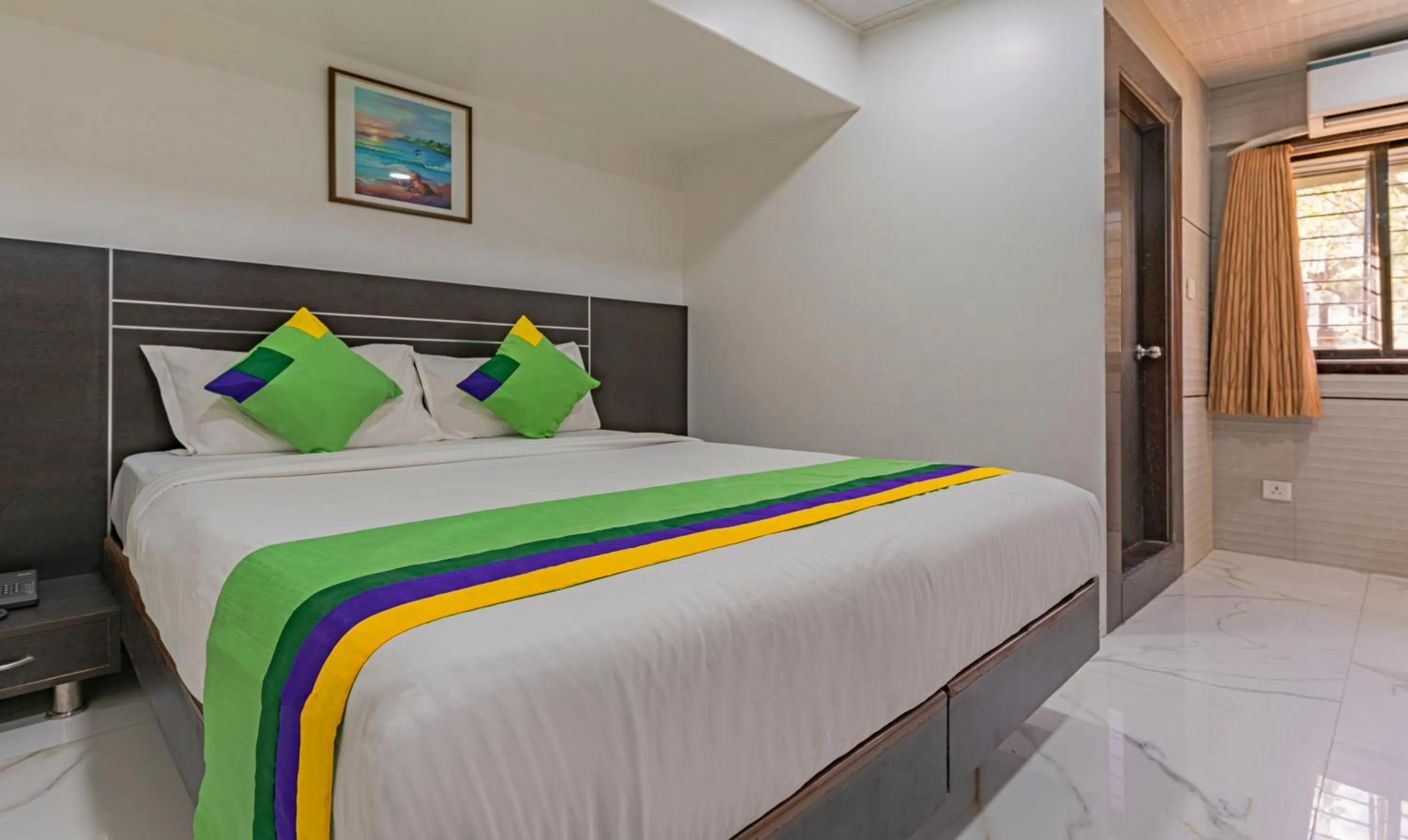 Bedroom, Bed in Treebo Atithi Inn Malad