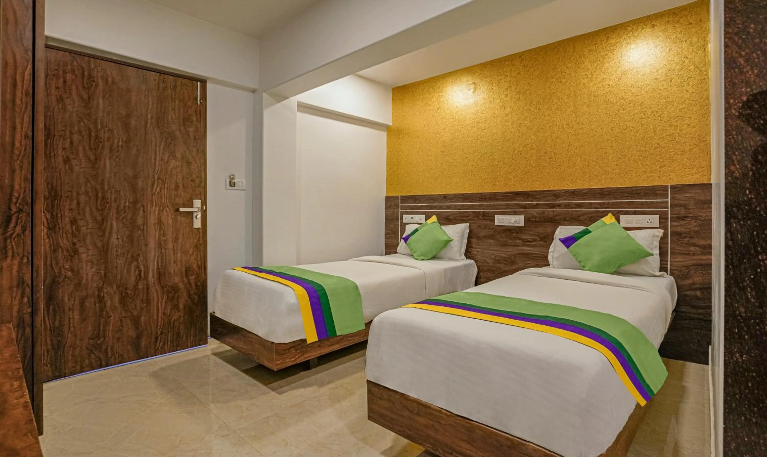 Bedroom, Bed in Treebo Atithi Inn Malad