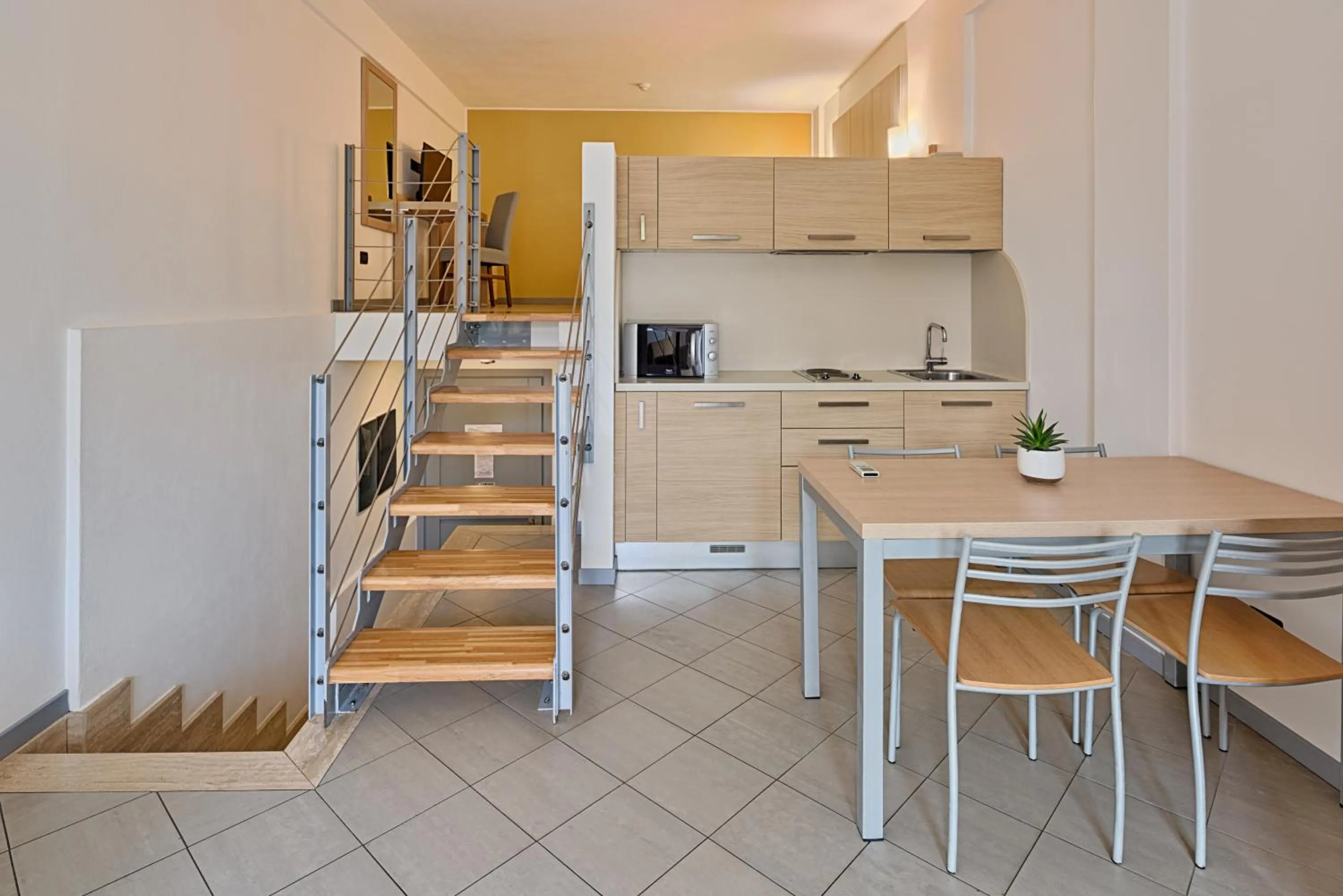 Kitchen or kitchenette in Aregai Marina Hotel & Residence