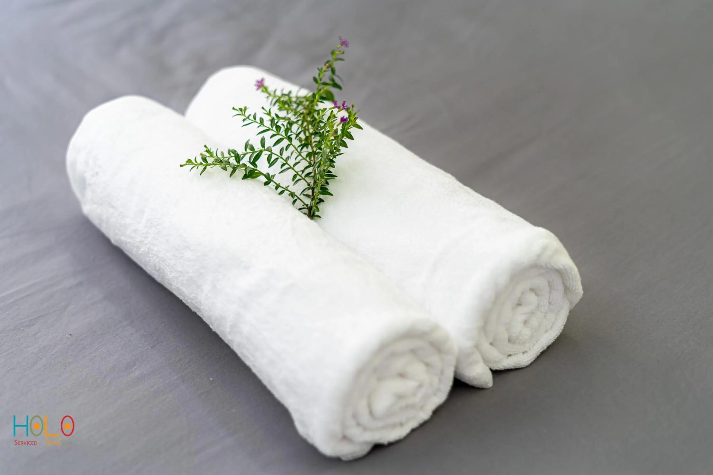 towels in HoLo Central Saigon - Serviced HomeStay