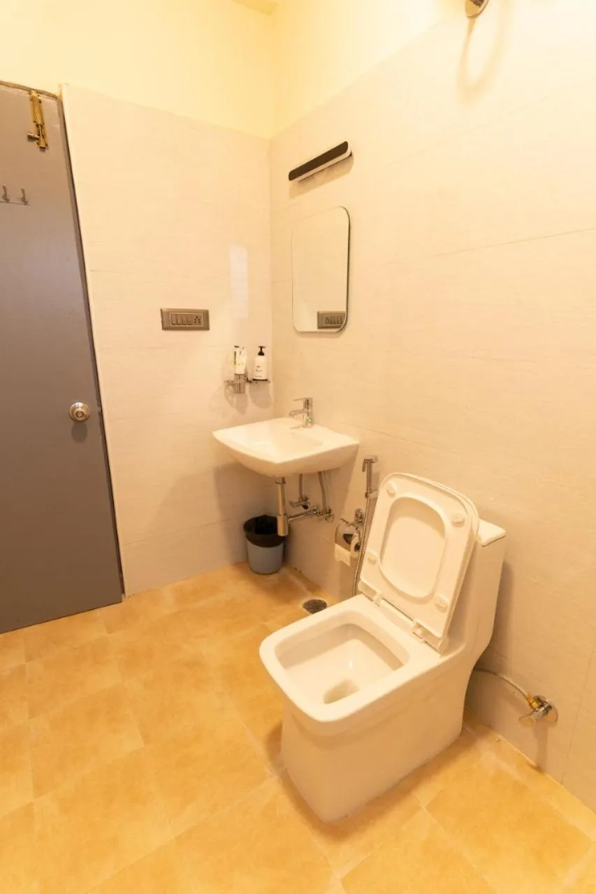 Toilet in Regal Business Suites