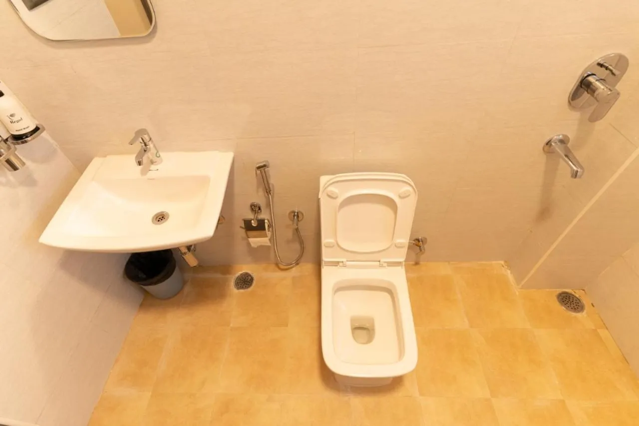 Toilet in Regal Business Suites