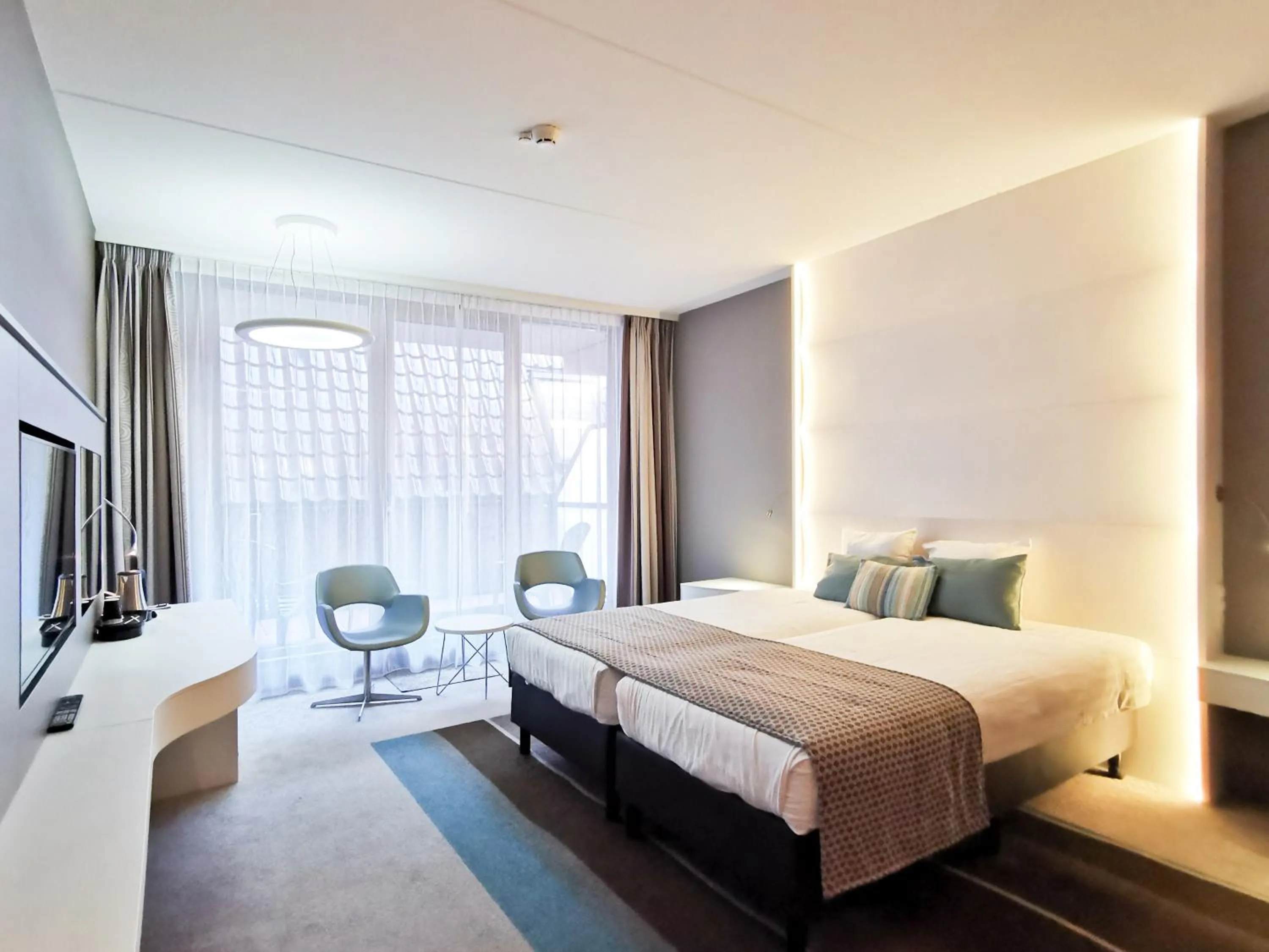 Bed in Strandhotel Golfzang