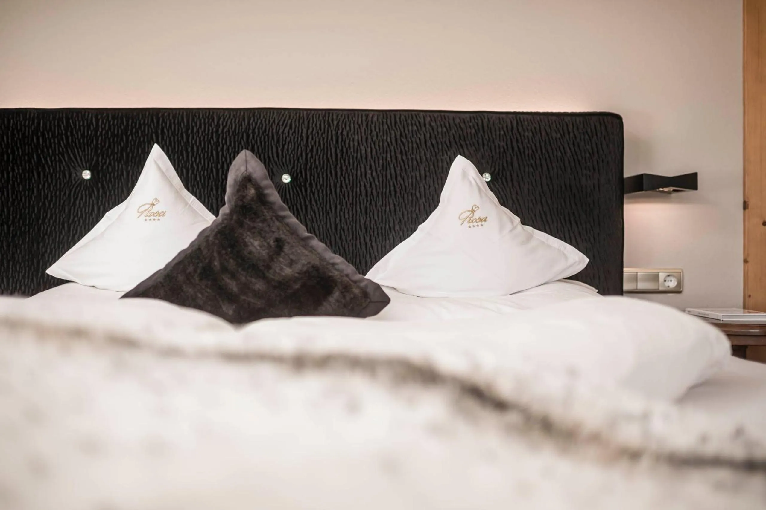 Bed in Hotel Rosa Eco Alpine Spa