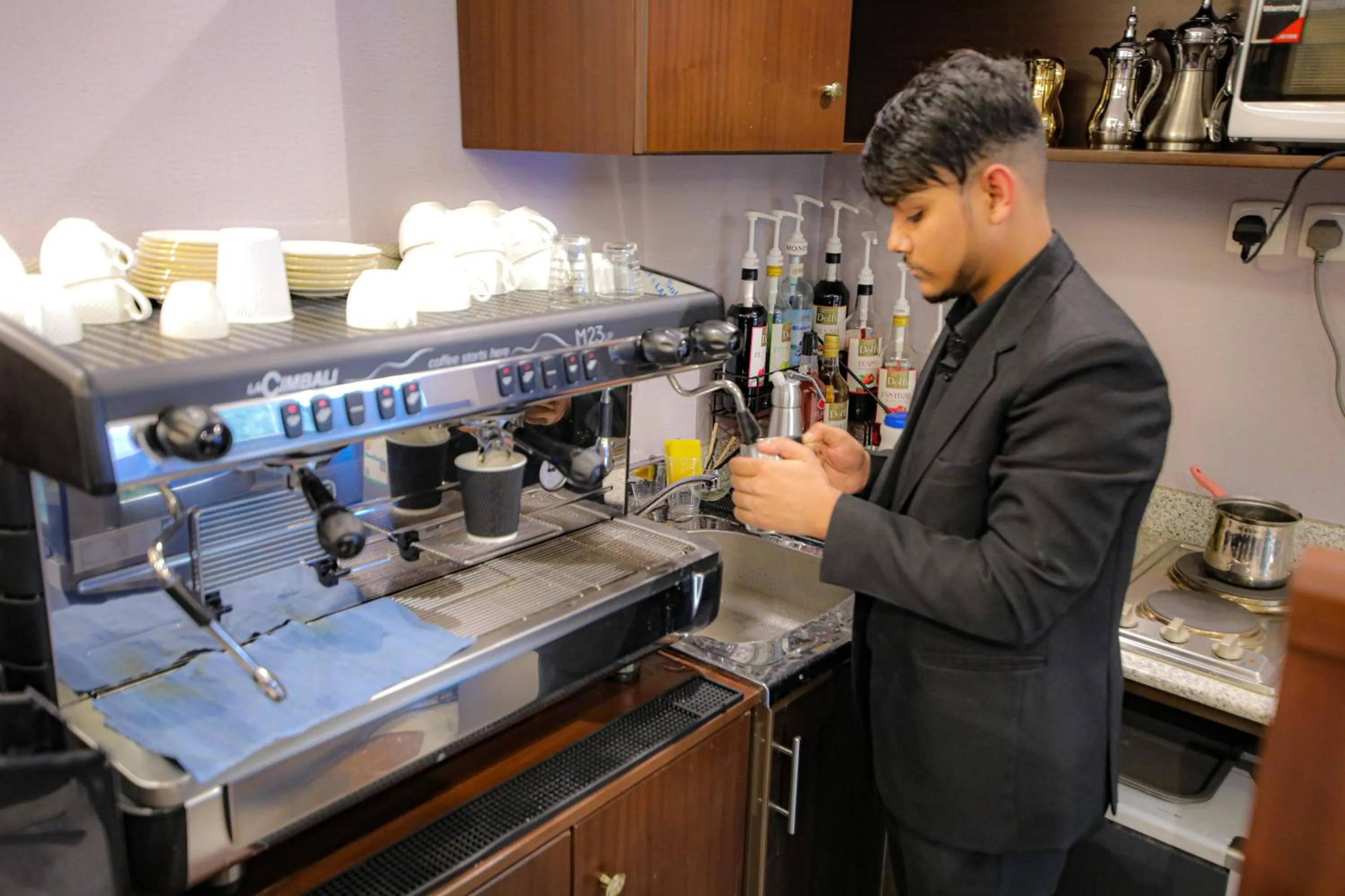 Staff in Laten Suites Al Salim Plaza