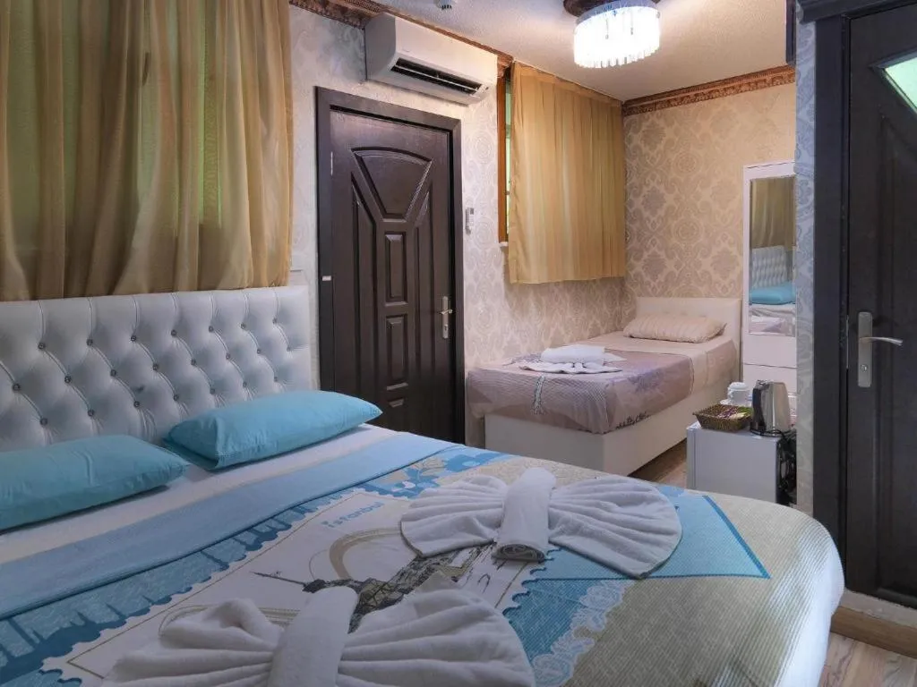 Bed in DİYAR BUDGET HOTEL