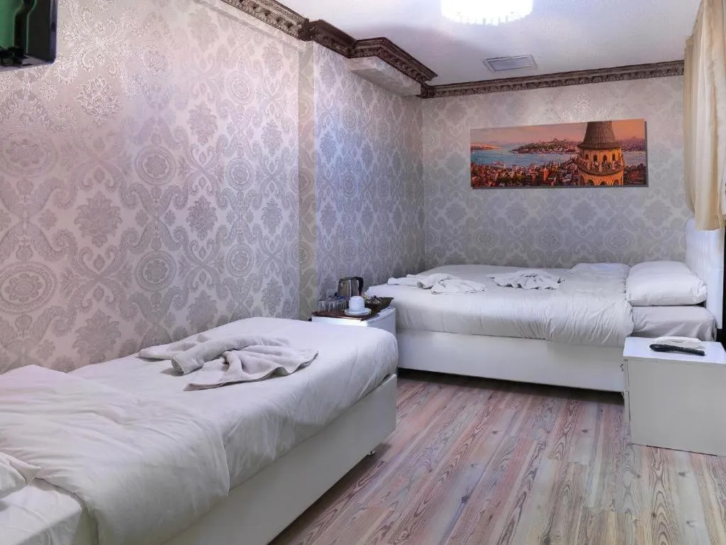 Bed in DİYAR BUDGET HOTEL