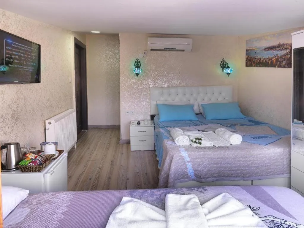 Bed in DİYAR BUDGET HOTEL