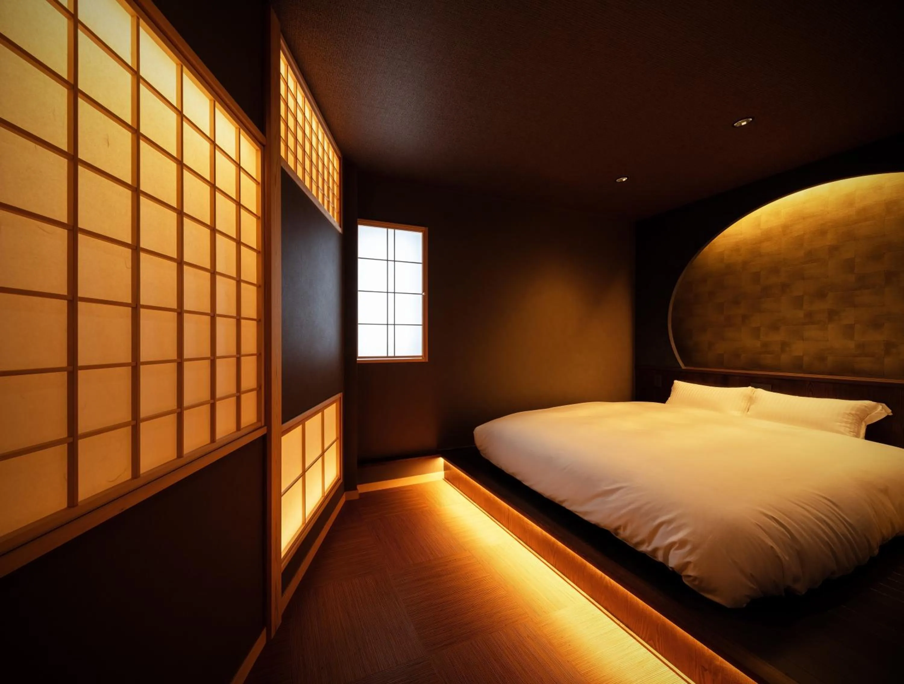 Bedroom, Bed in 古今 天下茶屋 with a private parking lot and a half open-air bath and direct to KIX
