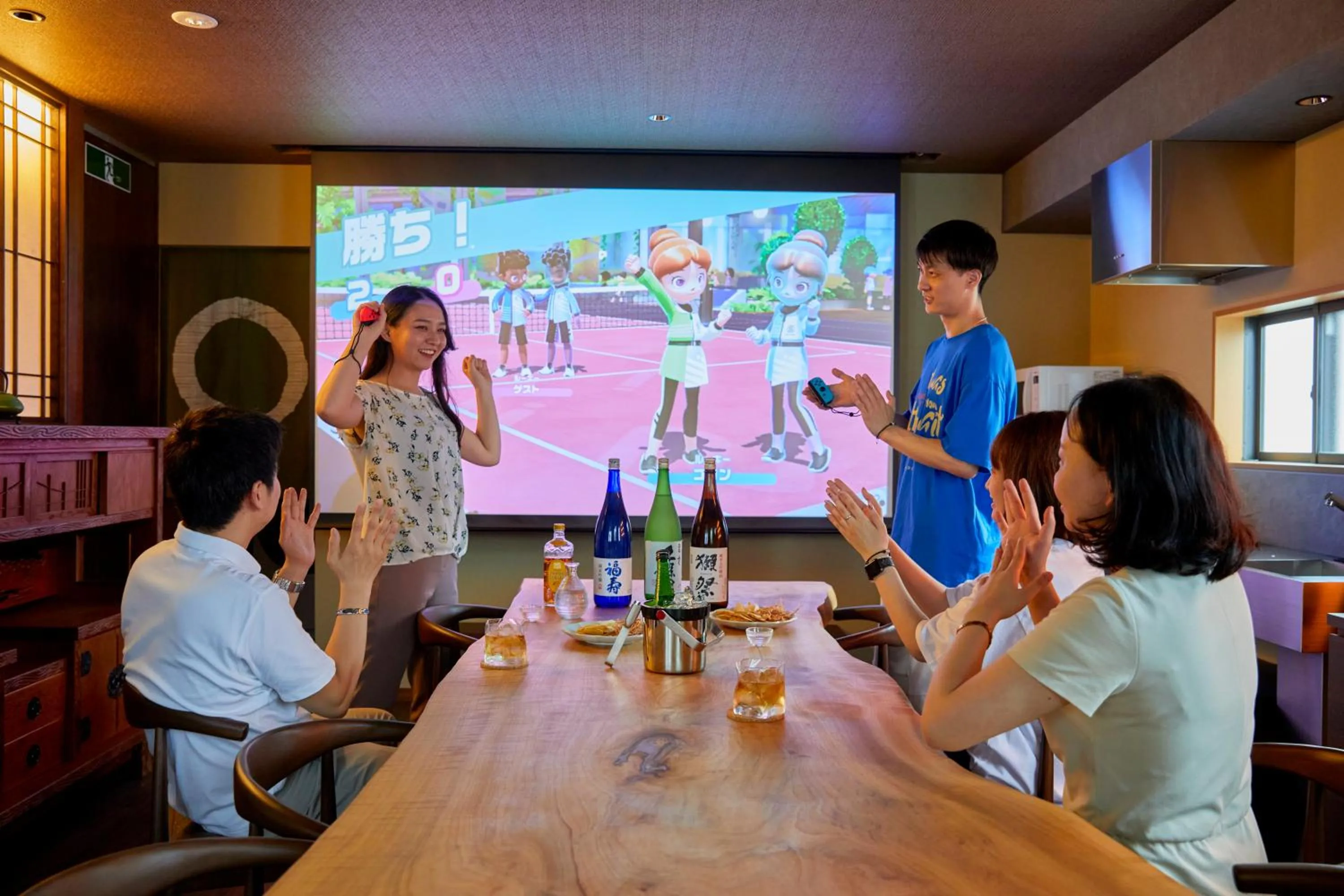 Living room in 古今 天下茶屋 with a private parking lot and a half open-air bath and direct to KIX