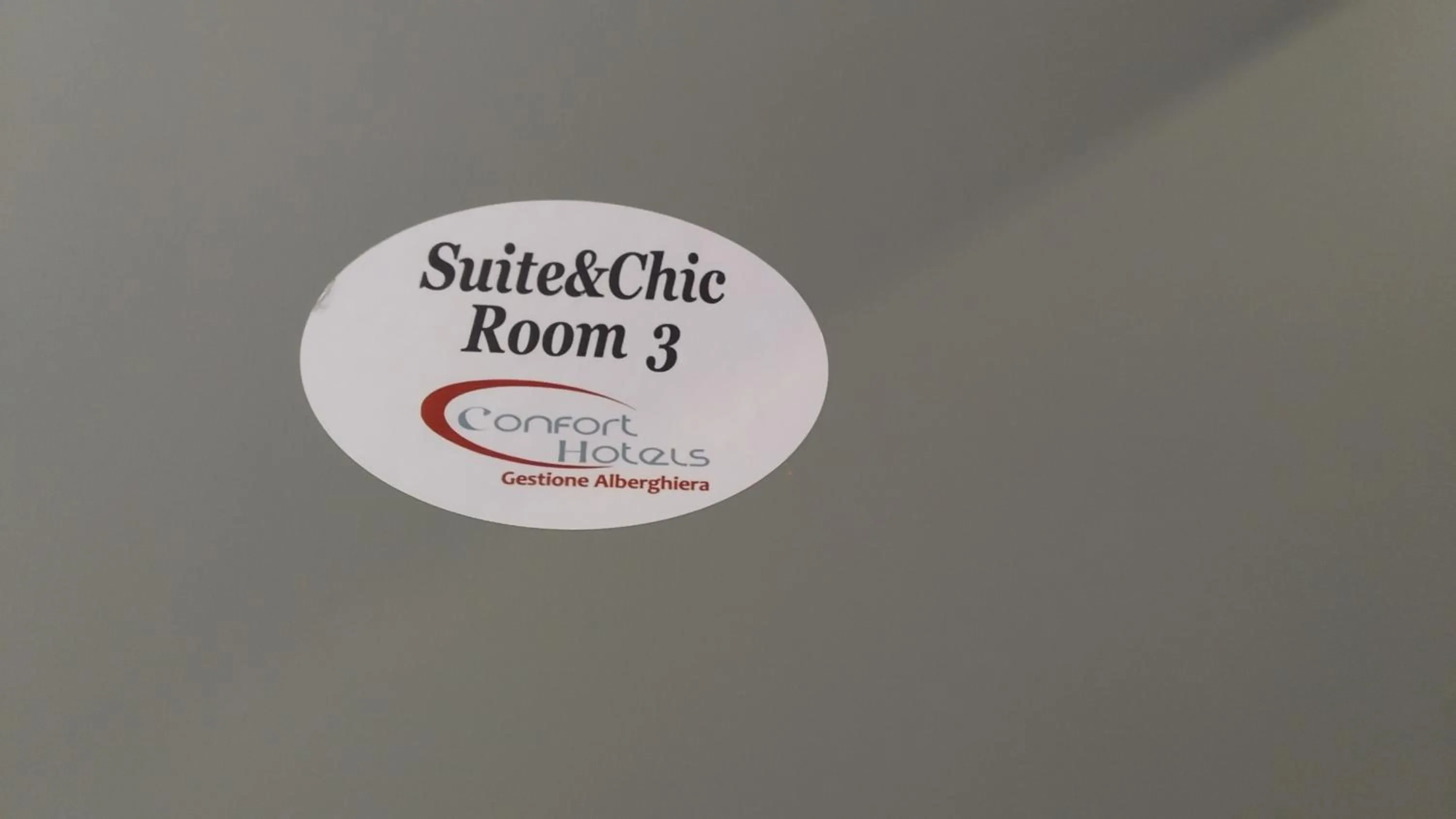 Property logo or sign in Cconforthotels Suite&Chic