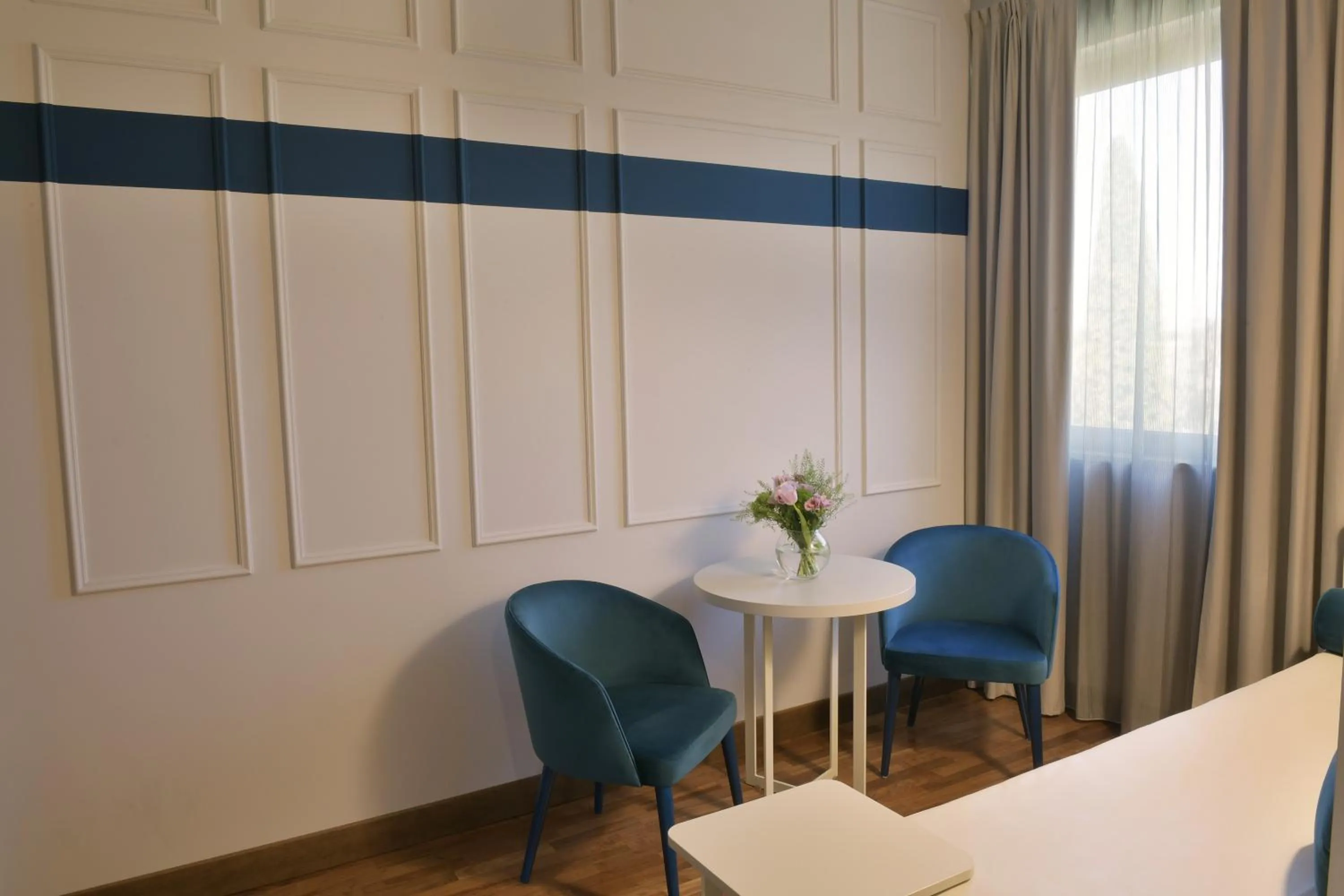 Living room, Bed in Hotel Torresi