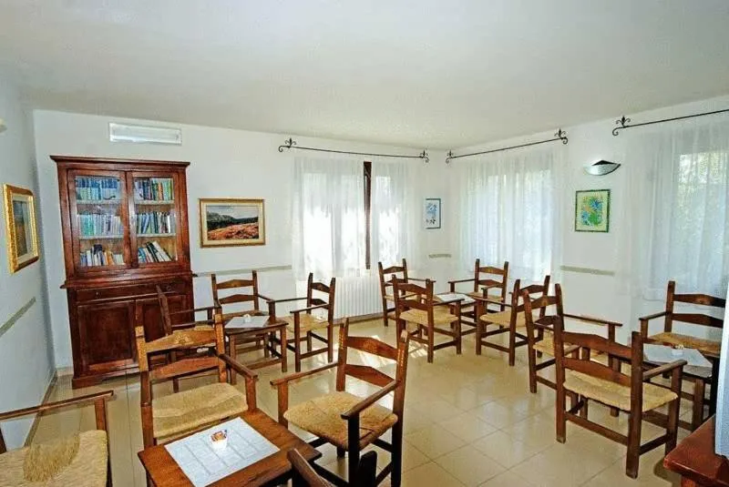 Communal lounge/ TV room in S'Enis Monte Maccione