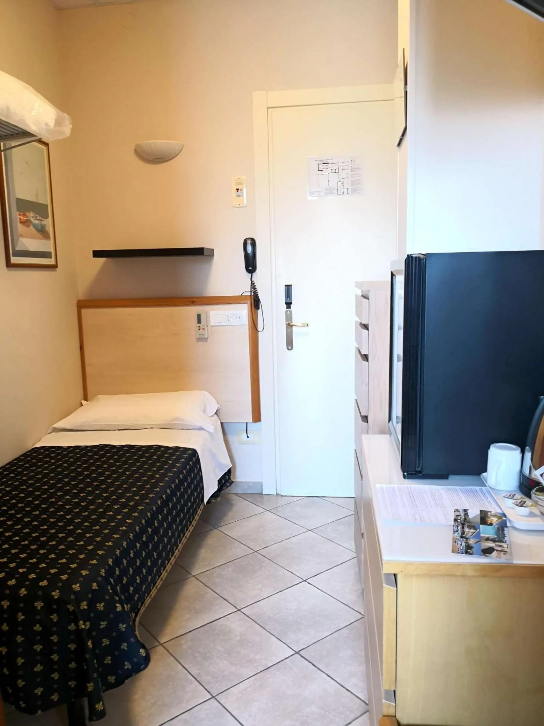 Bed in Hotel Delle Mimose