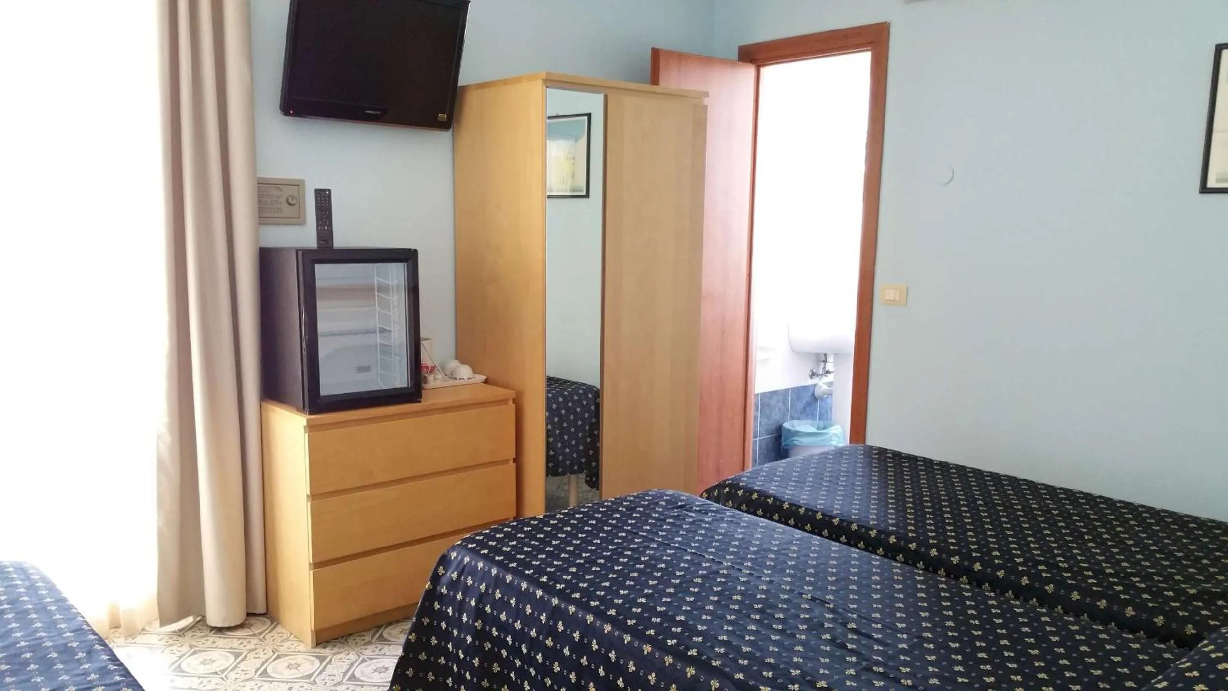 Bed in Hotel Delle Mimose