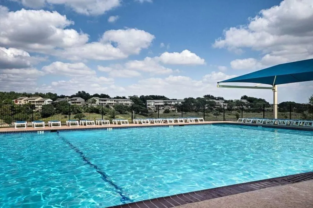 Swimming pool in Cozy 3br/2bath vacation house at Lake Travis