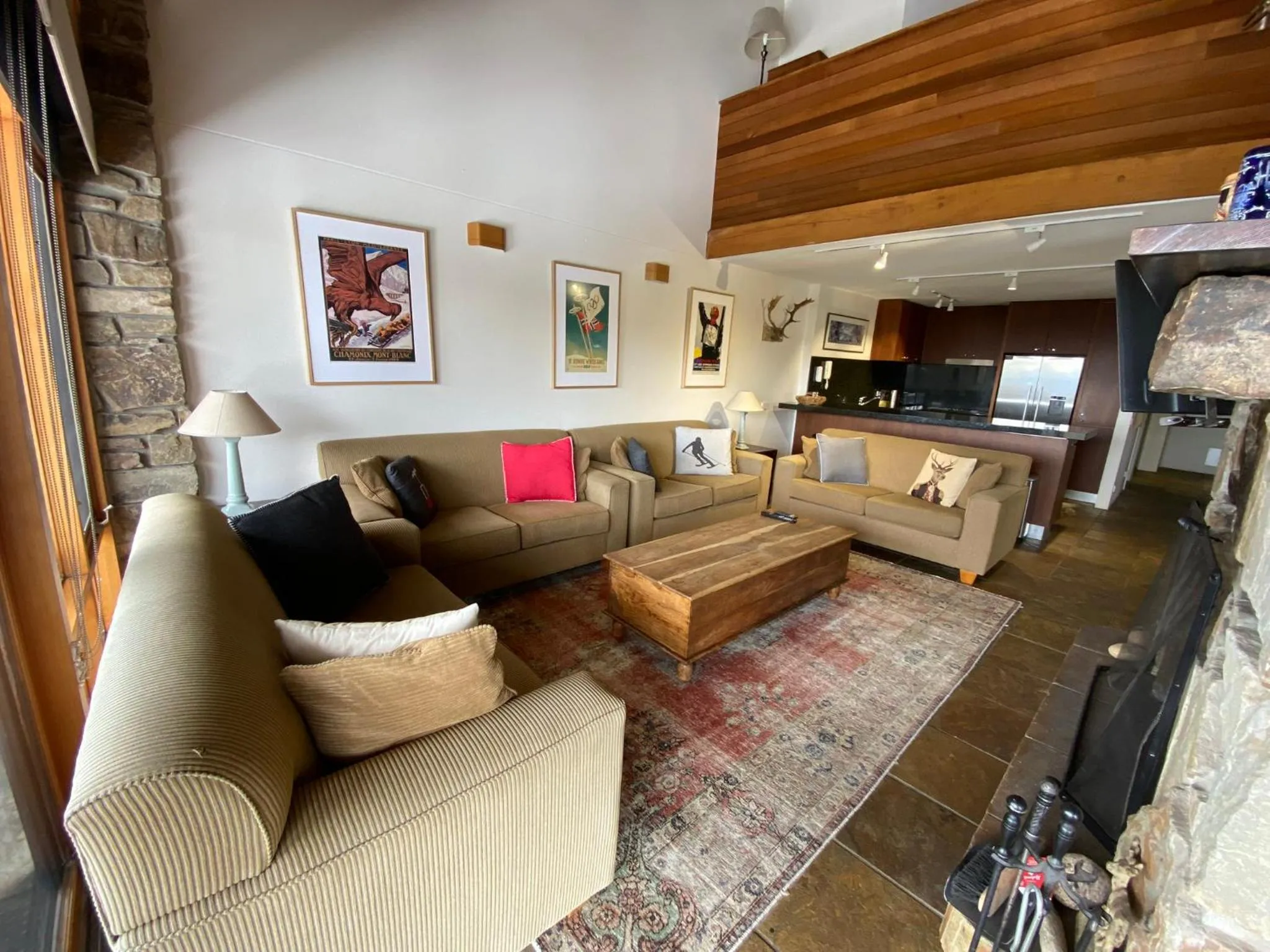 Living room in Alpine Woodsmoke Apartments