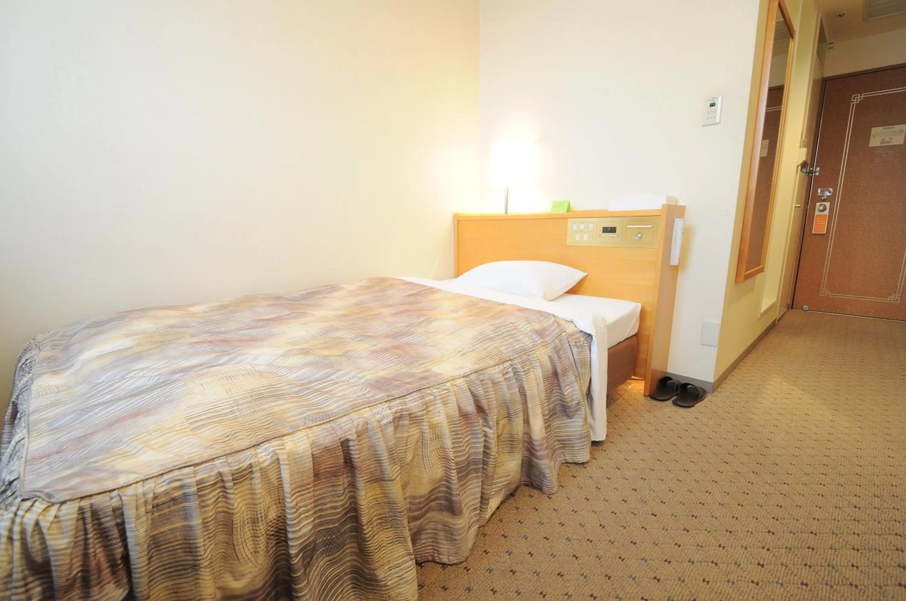 Photo of the whole room, Bed in Hotel Sapporo Sun Plaza