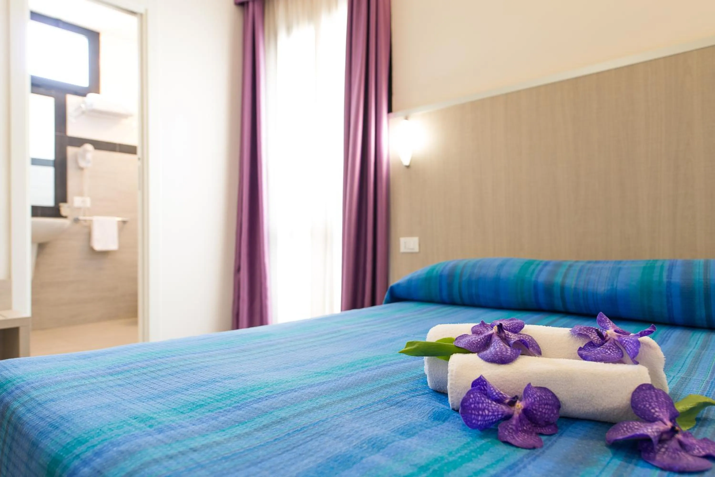 Bedroom, Bed in Hotel Villa Argia Rimini Marina Centro