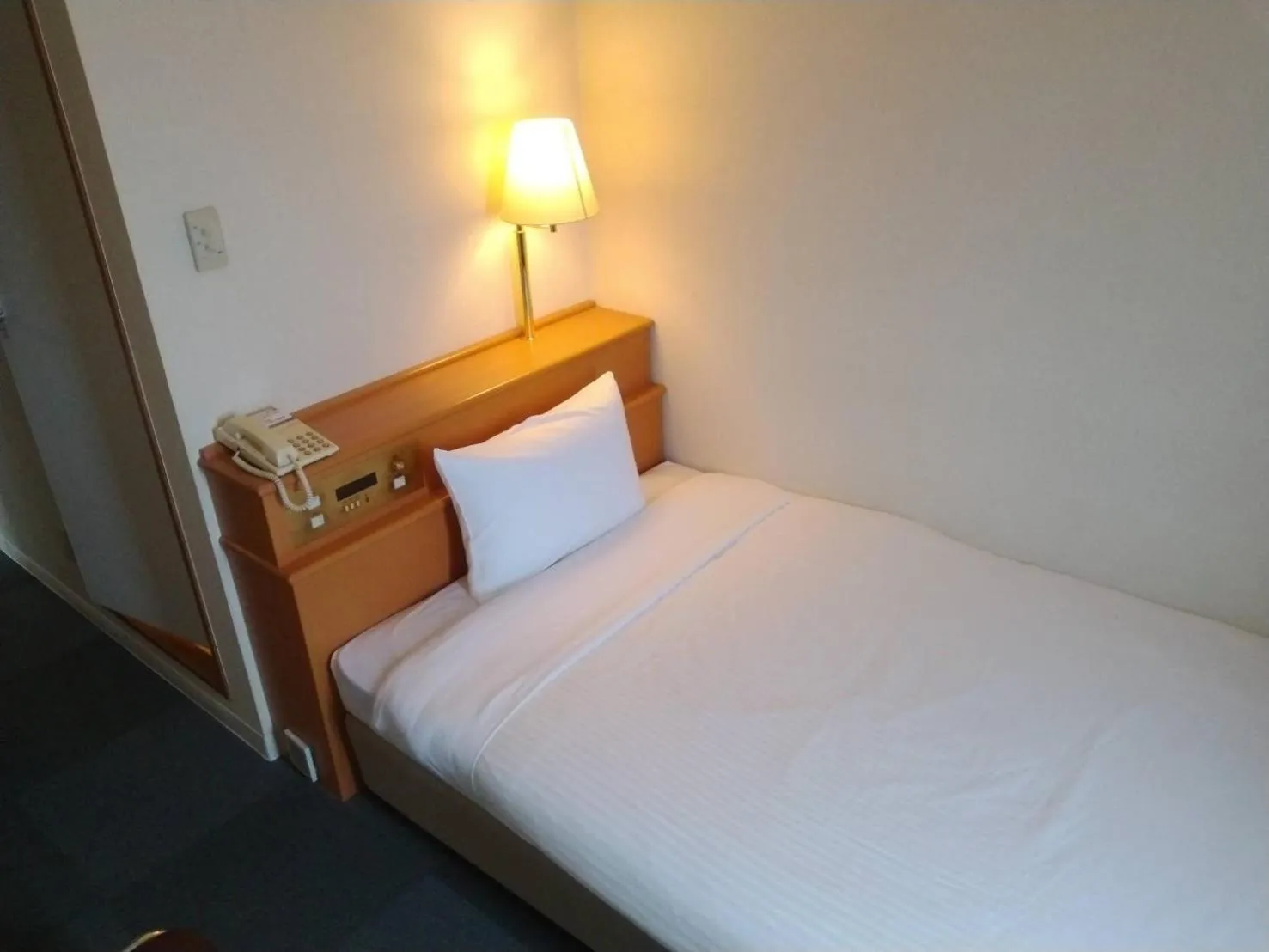 Bed in Kitami Daiichi Hotel